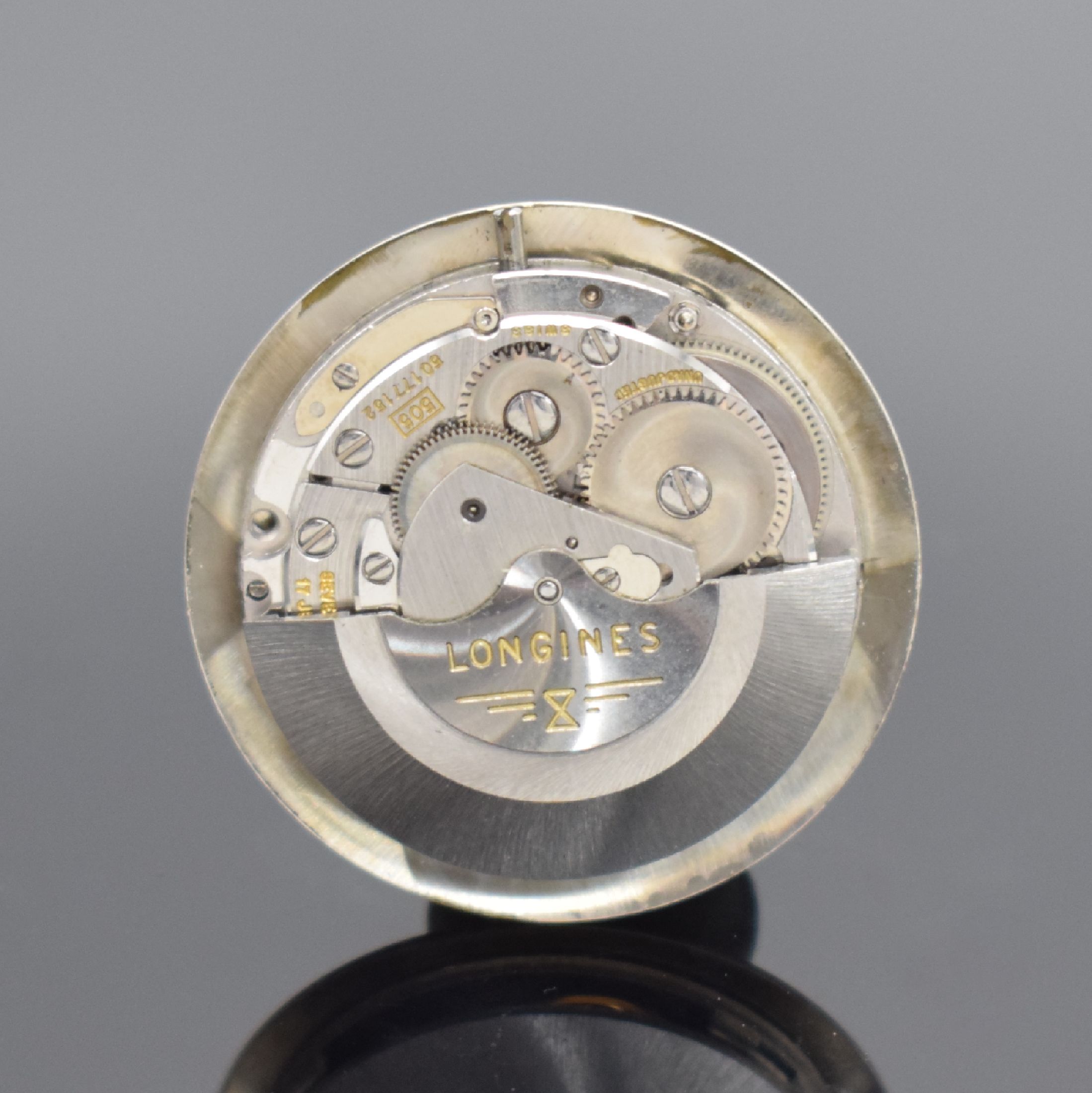 Detail e: LONGINES Admiral Armbanduhr in 10 k Gold filled, Schweiz / USA um 1965, Automatik, Monocoque-Geh., ausgefallenes silb. Duoton- Zifferbl., aufges. ...