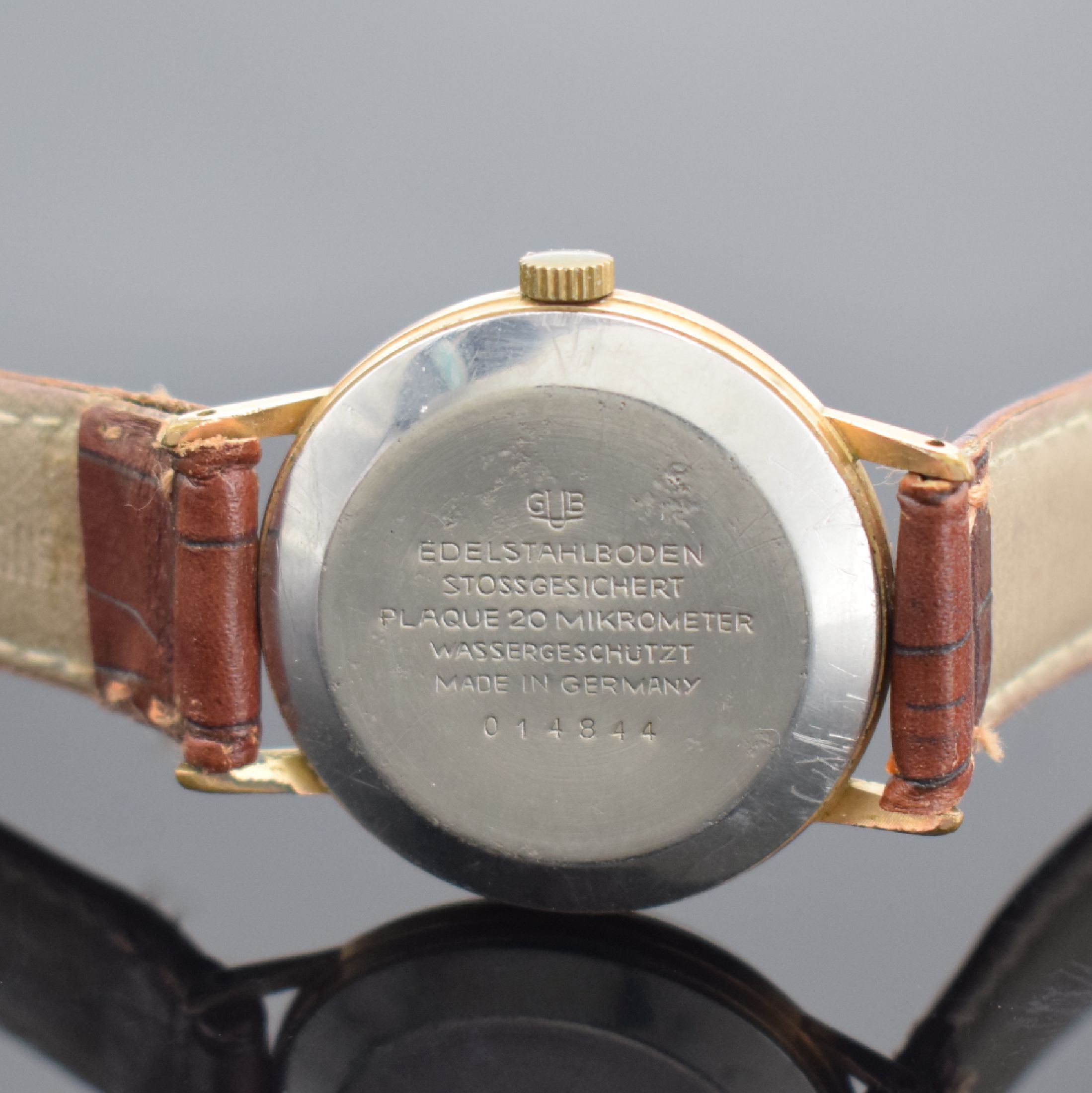 Detail c: GUB GLASHÜTTE Spezimatic Herrenarmbanduhr, DDR um 1970, Automatik, verg. Geh. m. aufgedr. Stahlboden, silb. Zifferbl. m. gold. Indizes, vern. Werk ...
