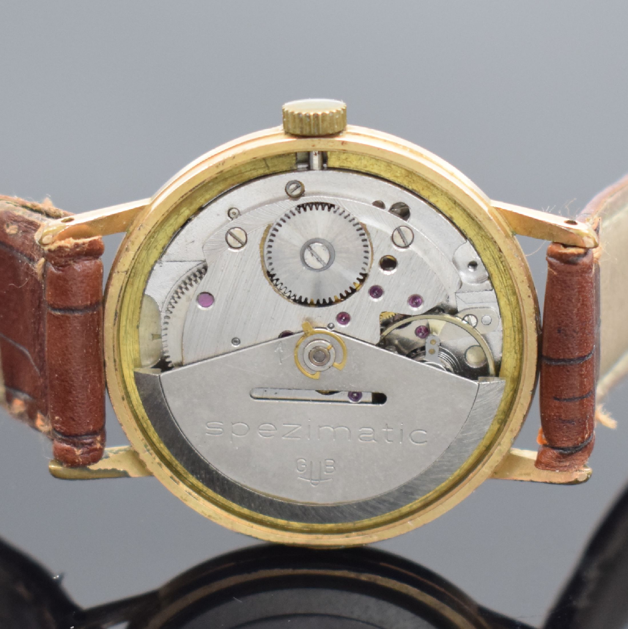 Detail d: GUB GLASHÜTTE Spezimatic Herrenarmbanduhr, DDR um 1970, Automatik, verg. Geh. m. aufgedr. Stahlboden, silb. Zifferbl. m. gold. Indizes, vern. Werk ...