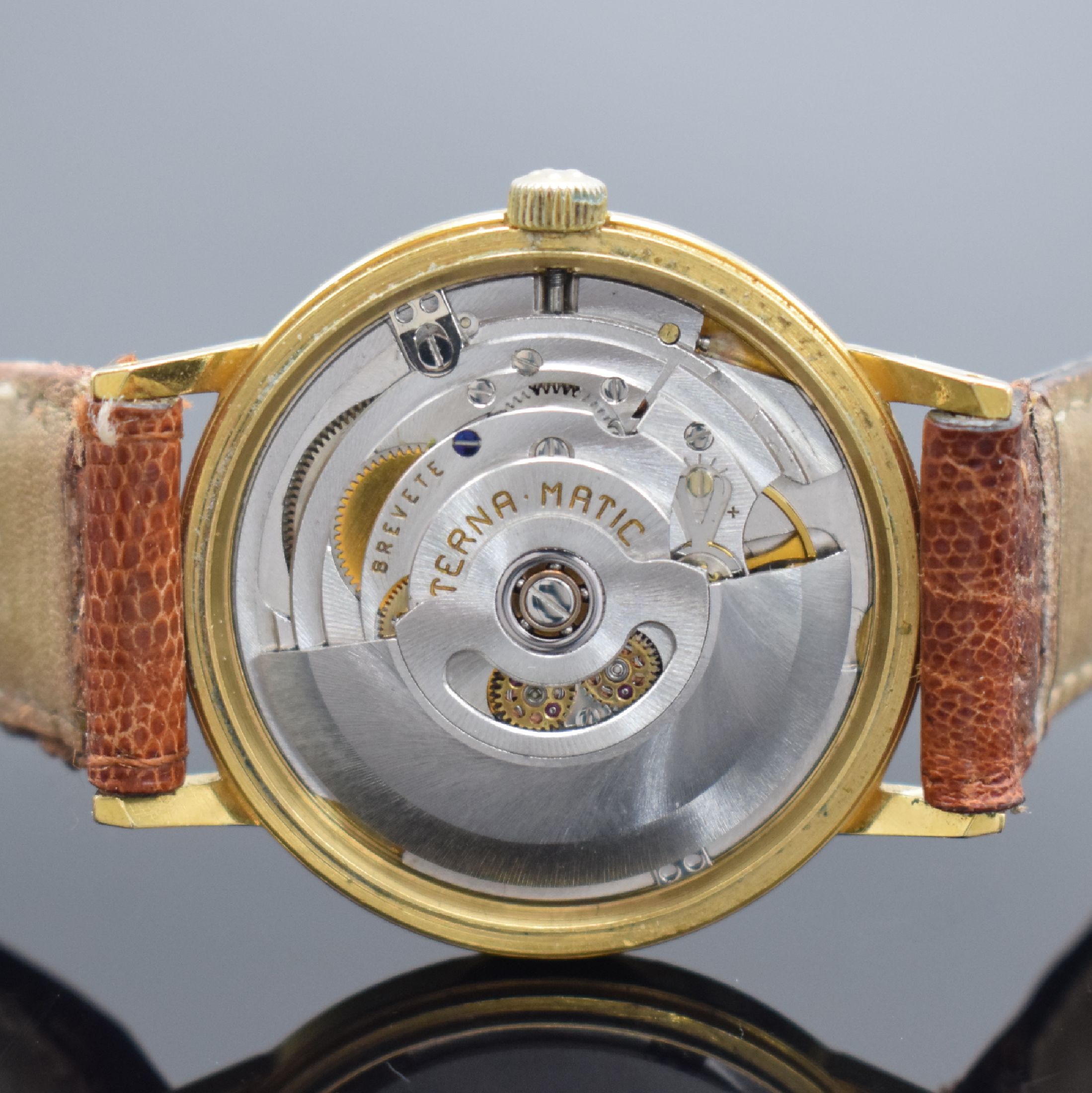 Detail e: ETERNA-MATIC 2 Herrenarmbanduhren, Schweiz um 1970, Automatik, 1. Ref. 346T, verschr. Stahlgeh. m. Goldhaube, silb. Zifferbl., gold. Indizes & ...