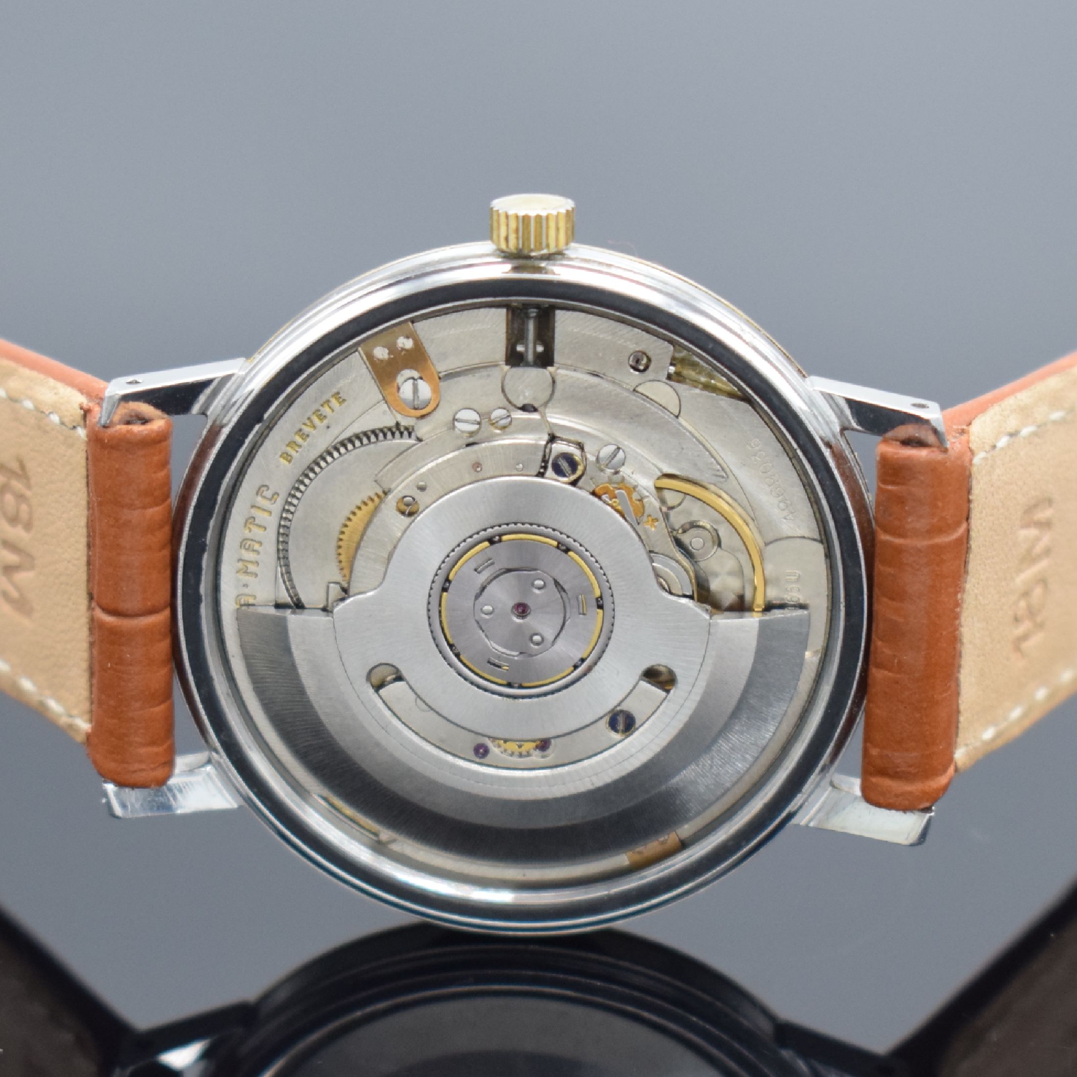 Detail k: ETERNA-MATIC 2 Herrenarmbanduhren, Schweiz um 1970, Automatik, 1. Ref. 346T, verschr. Stahlgeh. m. Goldhaube, silb. Zifferbl., gold. Indizes & ...