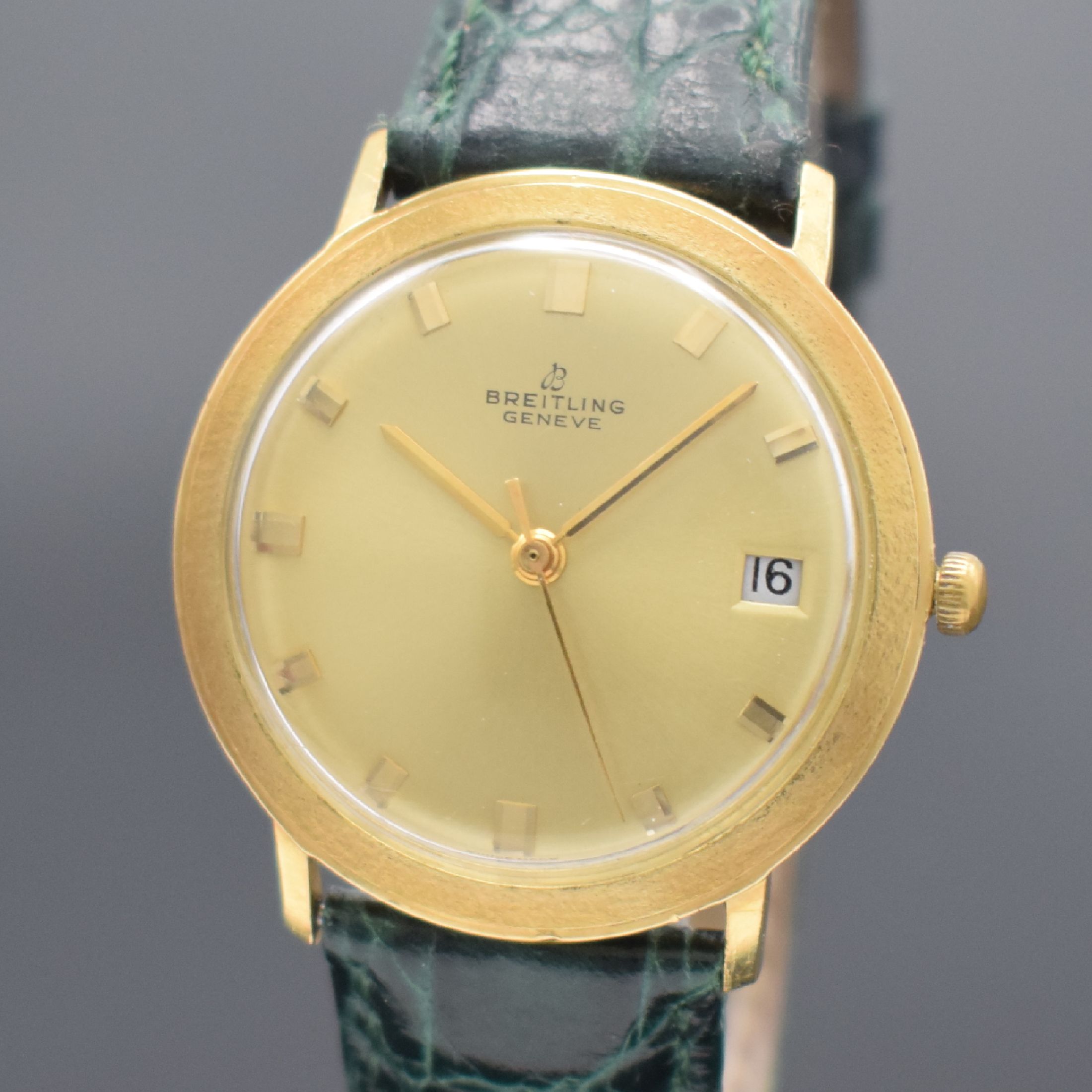 Detail a: BREITLING Referenz 2614 Herrenarmbanduhr in GG 750/000, Schweiz um 1965, Automatik, Monocoque-Geh., rückseitig sign., gold. Zifferbl., gold. Indizes ...