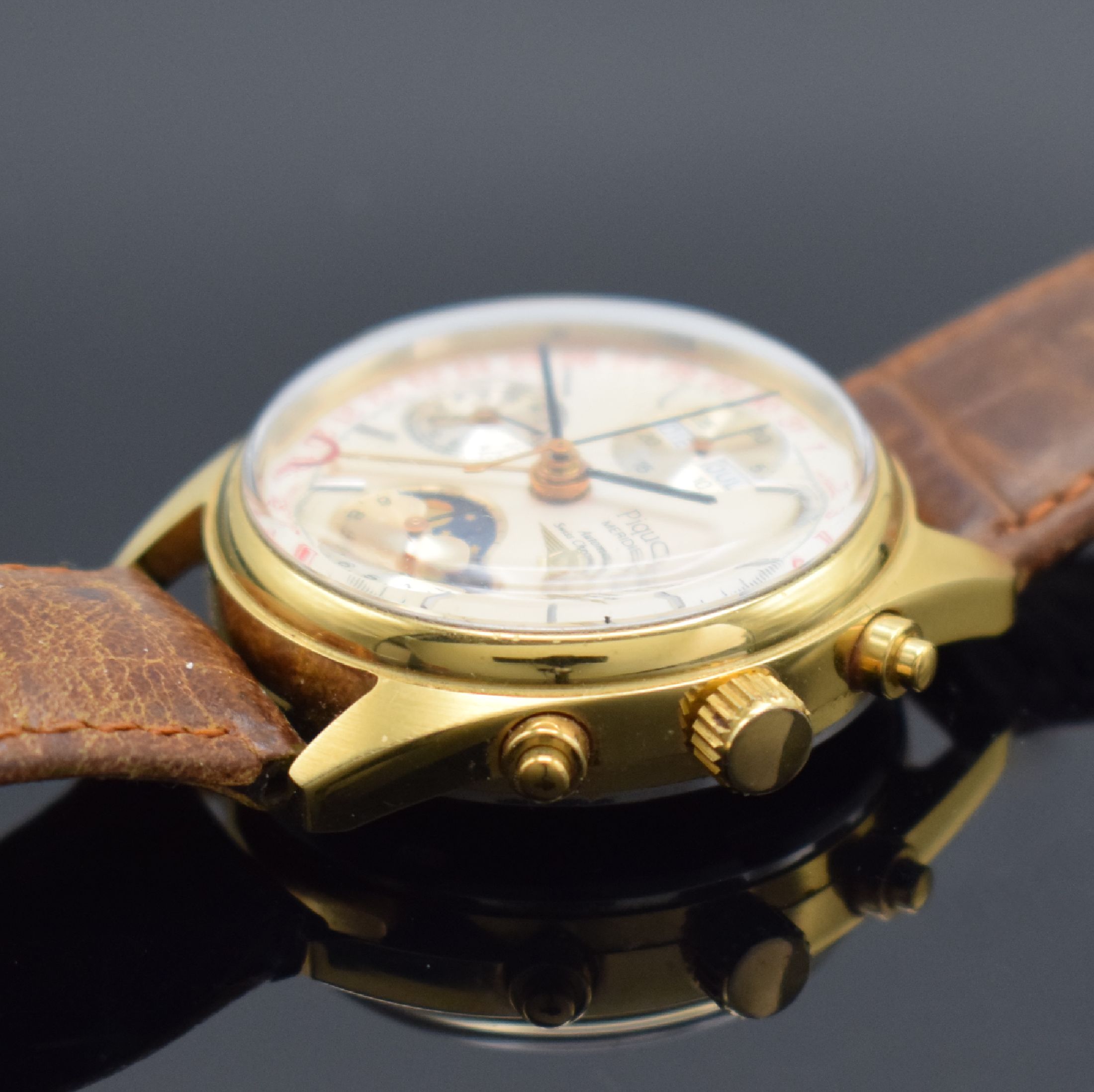 Detail c: PIQUOT Meridian Herrenchronograph mit Vollkalender, Schweiz um 1995, Automatik, verg. Geh. m. verschr. Stahlboden, silb. Zifferbl., Hilfsblätter f. ...