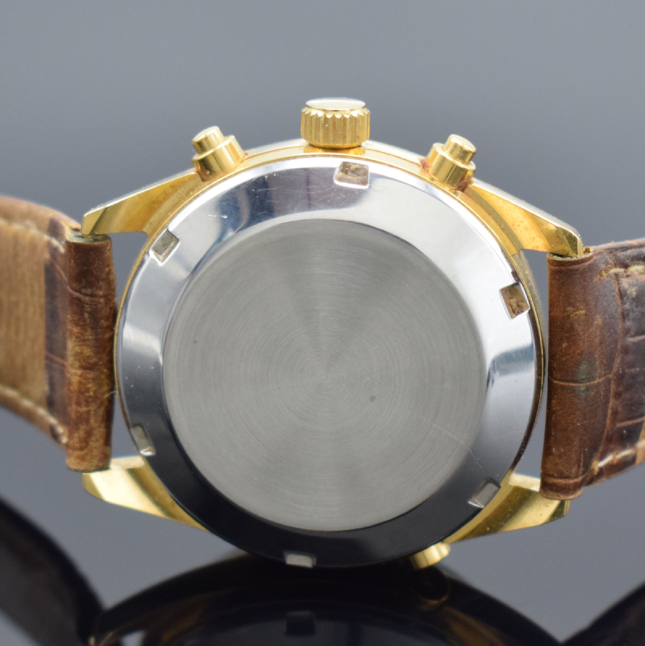 Detail d: PIQUOT Meridian Herrenchronograph mit Vollkalender, Schweiz um 1995, Automatik, verg. Geh. m. verschr. Stahlboden, silb. Zifferbl., Hilfsblätter f. ...