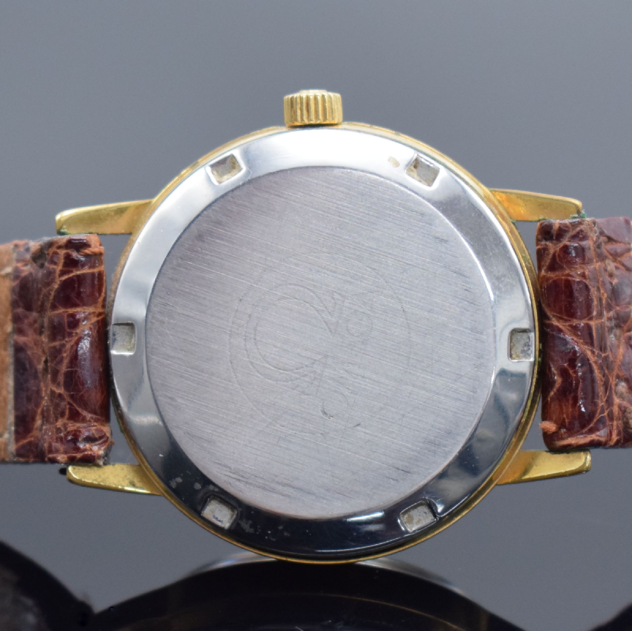 Detail c: OMEGA Geneve Herrenarmbanduhr, Schweiz um 1973, Automatik, verg. Geh. m. verschr. Stahlboden Ref. 1660163, orig. Glas & Krone, gold. Zifferbl., ...