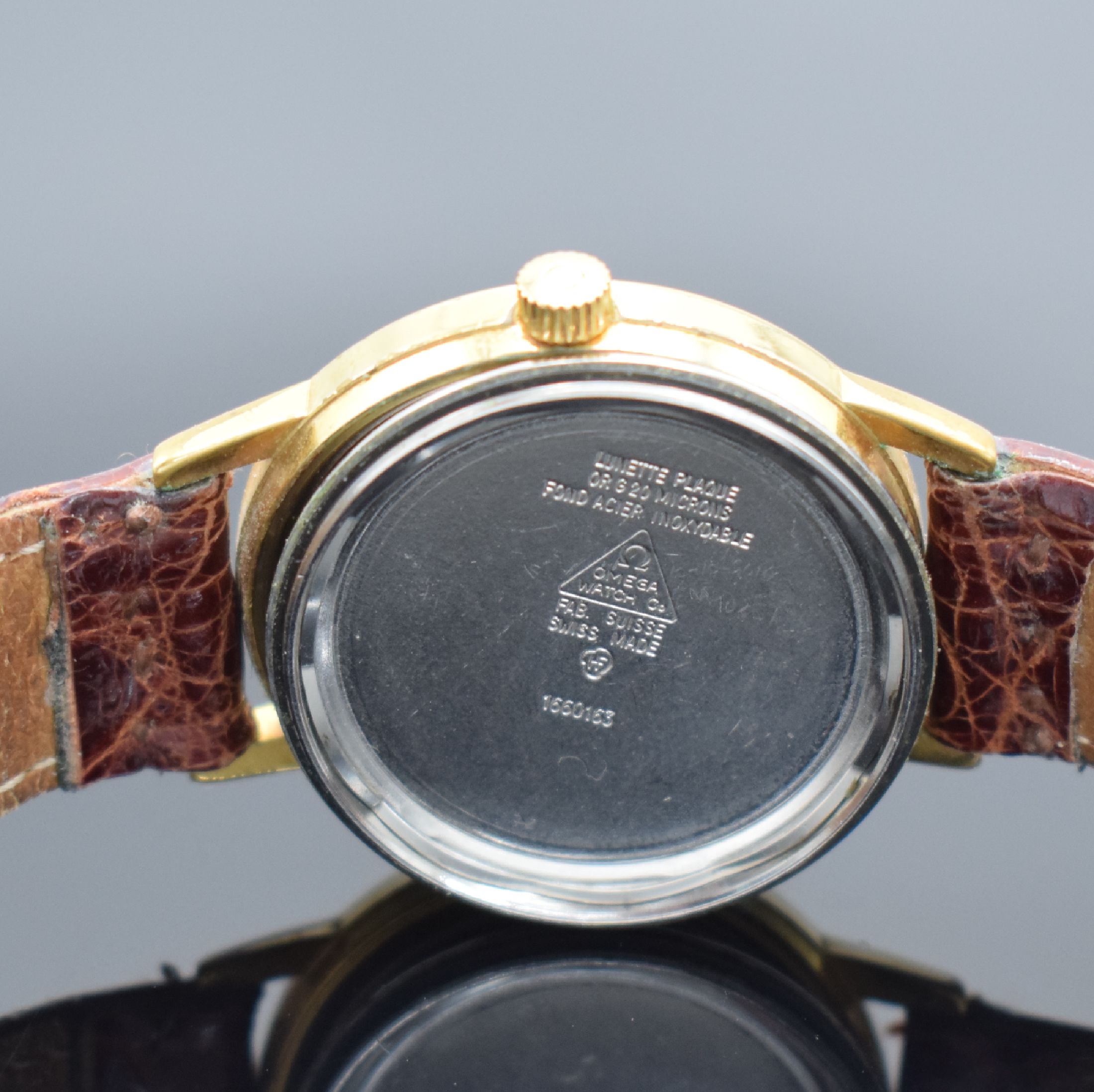 Detail f: OMEGA Geneve Herrenarmbanduhr, Schweiz um 1973, Automatik, verg. Geh. m. verschr. Stahlboden Ref. 1660163, orig. Glas & Krone, gold. Zifferbl., ...
