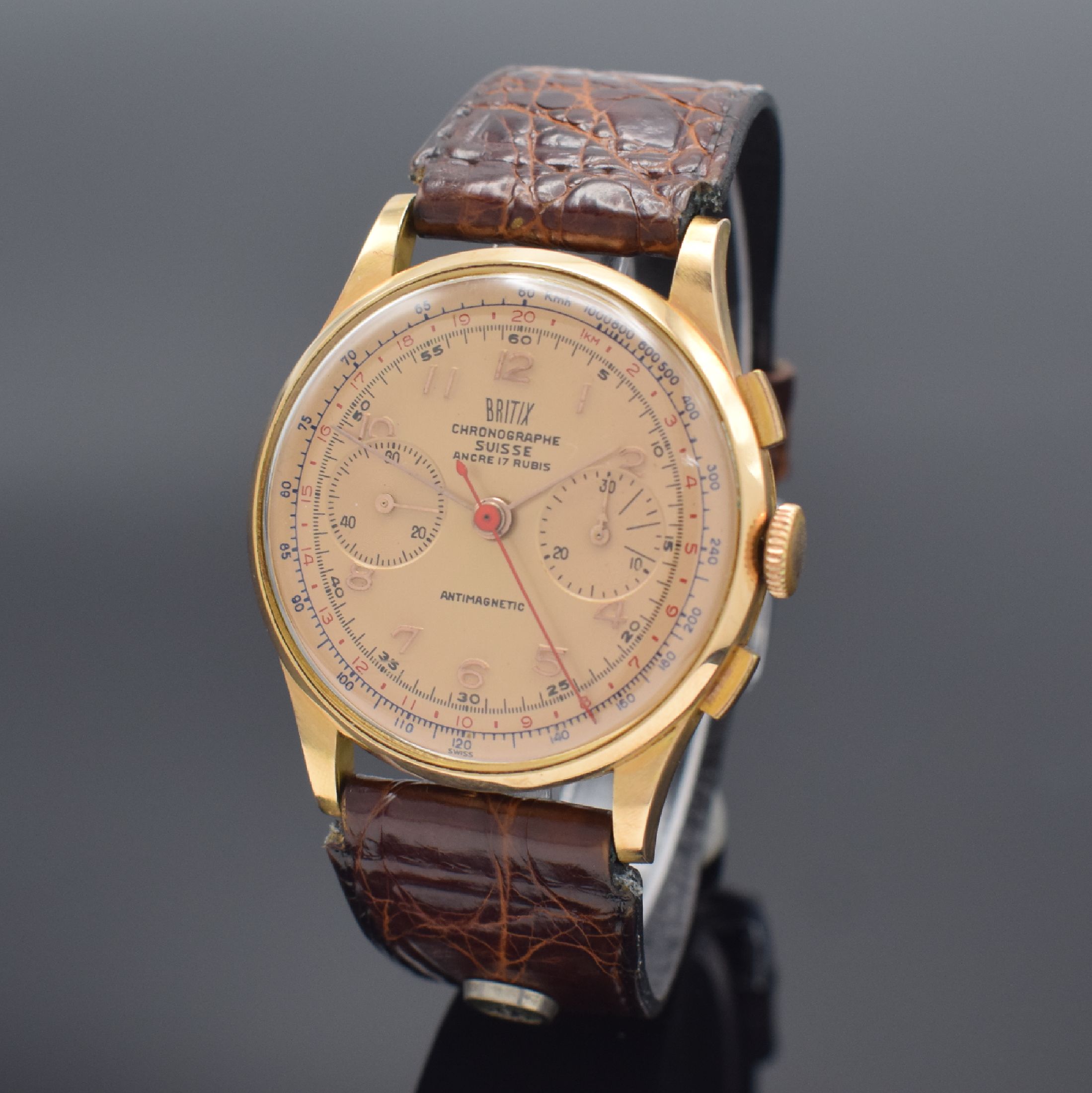 BRITIX / Chronographe Suisse Herrenarmbanduhr mit Chronograph in RG 750/000, Schweiz um 1950, Handaufzug, 3-teil. Geh., Boden & Glasrand aufgedr., ...