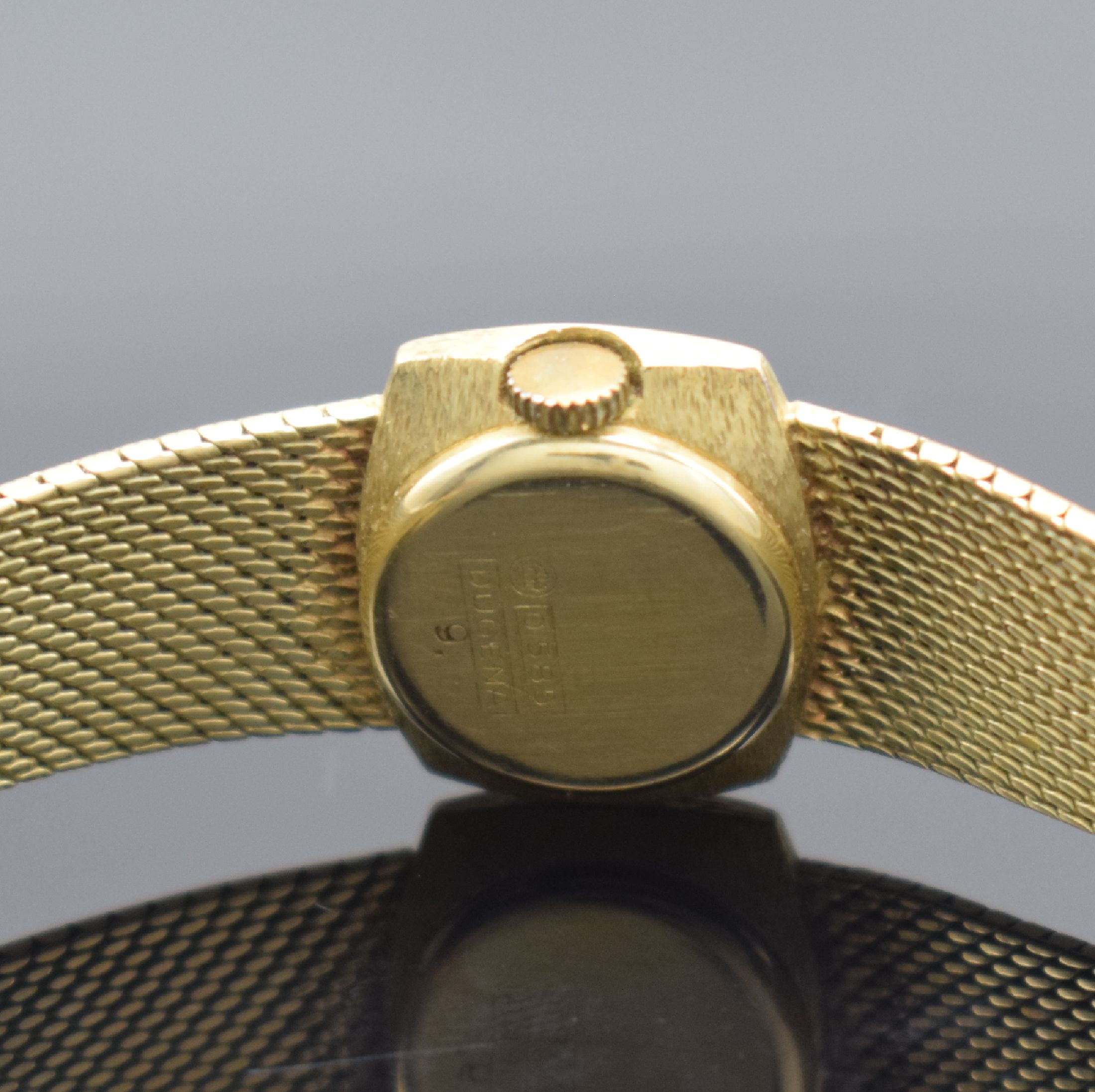 Detail c: DUGENA Damenarmbanduhr in GG 585/000, Deutschland um 1970, Handaufzug, 2-teil. Geh., Boden aufgedr., Milanaiseband in GG 585/000, silb. Zifferbl. m. ...