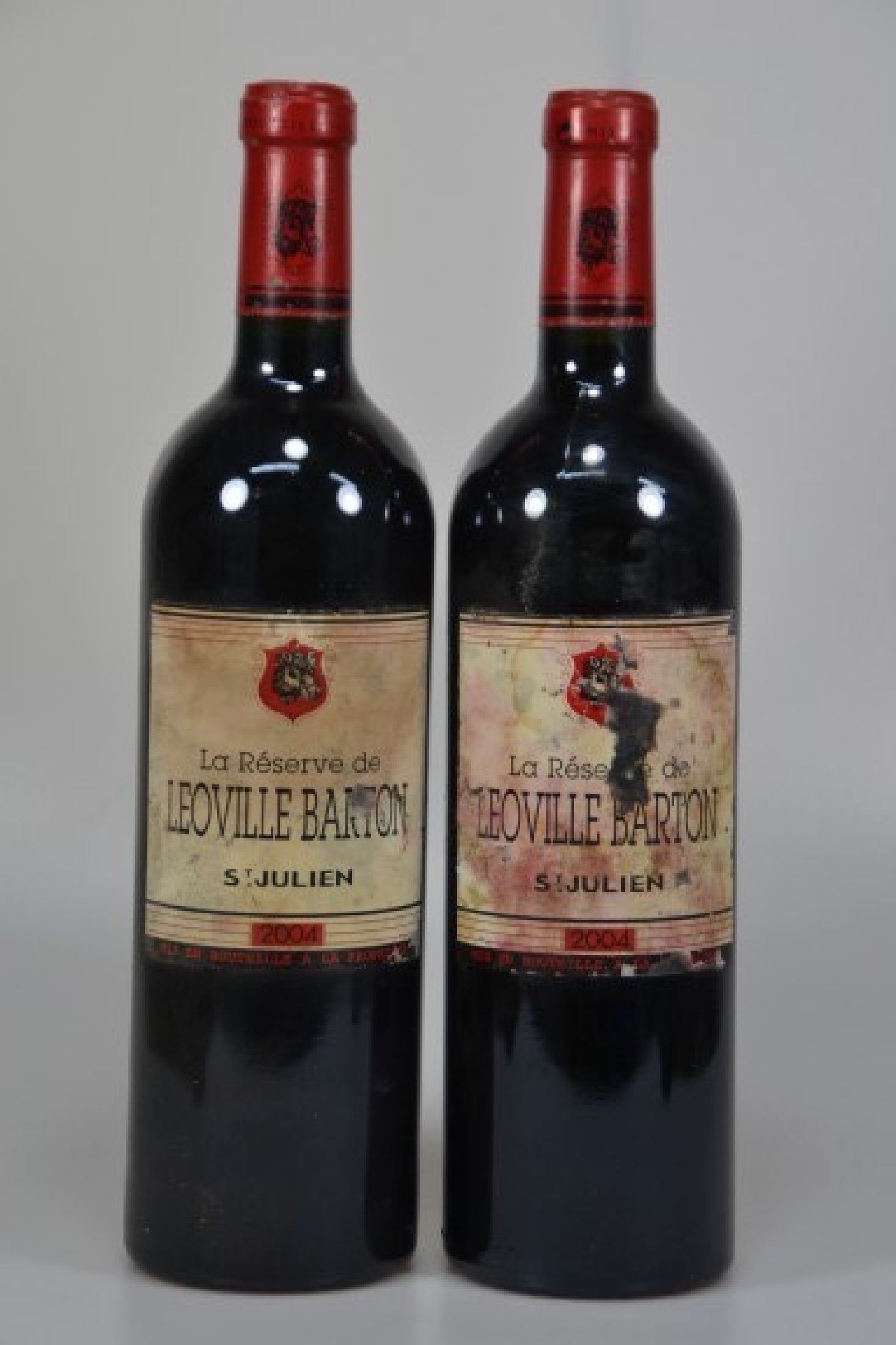 4 Flaschen, 2004, Leoville Barton, St. Julien , 750ml, 13%Vol., High Fill, Etiketten best.bzw. Feuchtigkeitsschaden, unverkostet