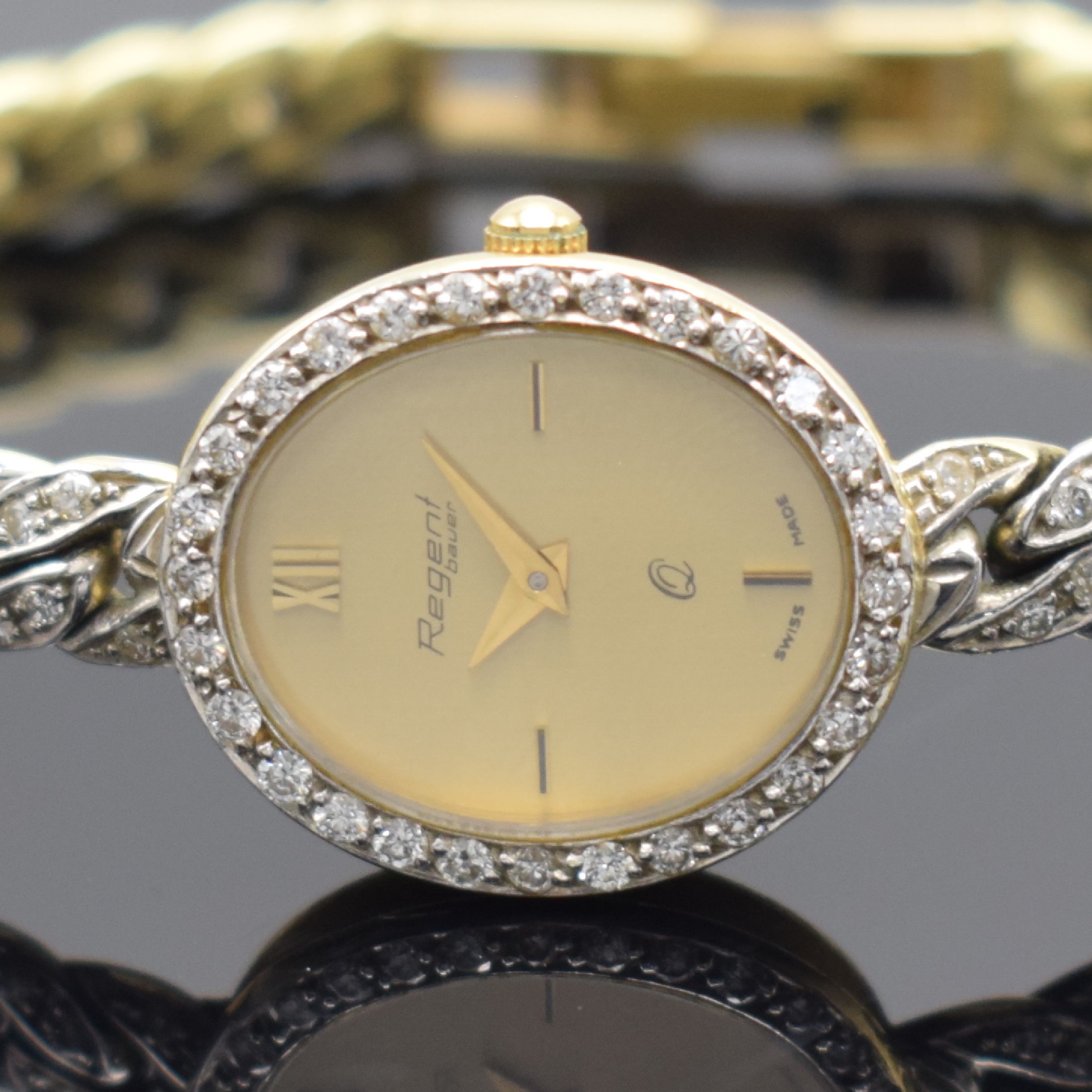 Detail a: REGENT bauer Damenarmbanduhr in GG 585/000 mit Diamantbesatz, Schweiz um 1980, quarz, Boden aufgedr., Lünette wie Band teilw. m. Diamanten bes., ...