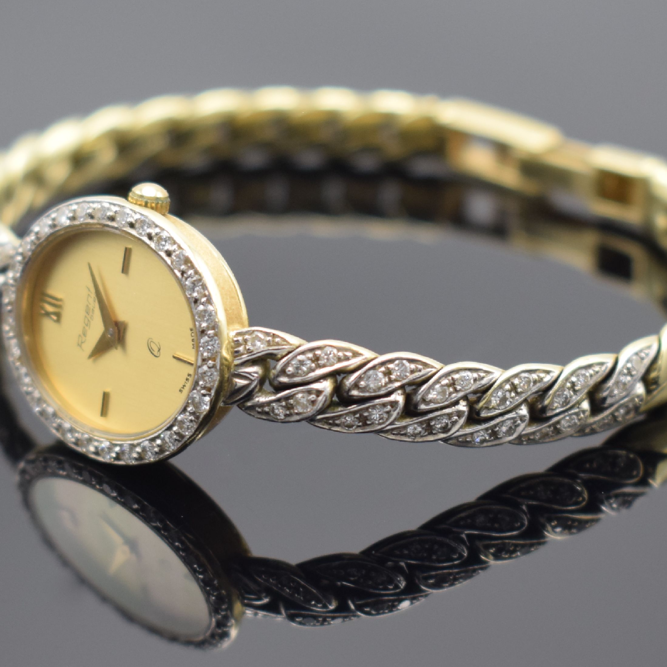 Detail b: REGENT bauer Damenarmbanduhr in GG 585/000 mit Diamantbesatz, Schweiz um 1980, quarz, Boden aufgedr., Lünette wie Band teilw. m. Diamanten bes., ...