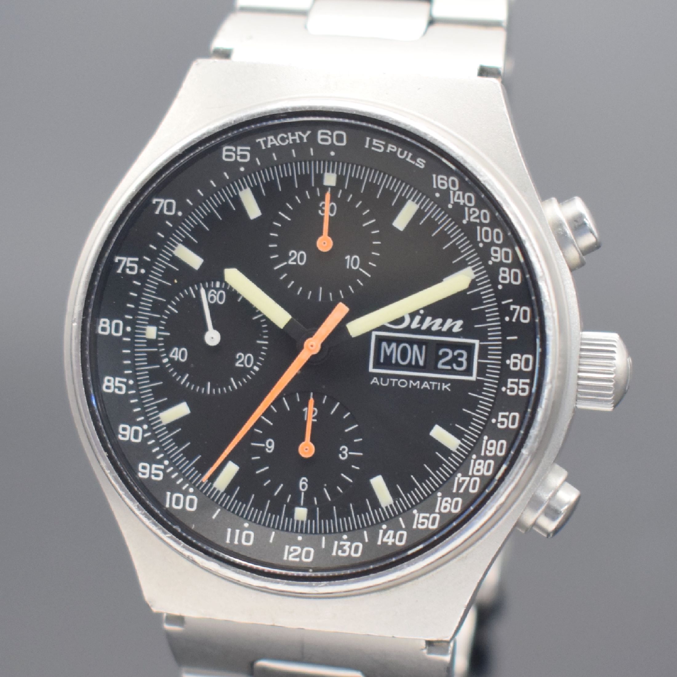 Detail a: SINN Herrenarmbanduhr mit Chronograph in Stahl, Schweiz um 1995, Automatik, matt. Edelstahlgeh. inkl. orig. Gliederband m. Faltschl., Boden & Krone ...