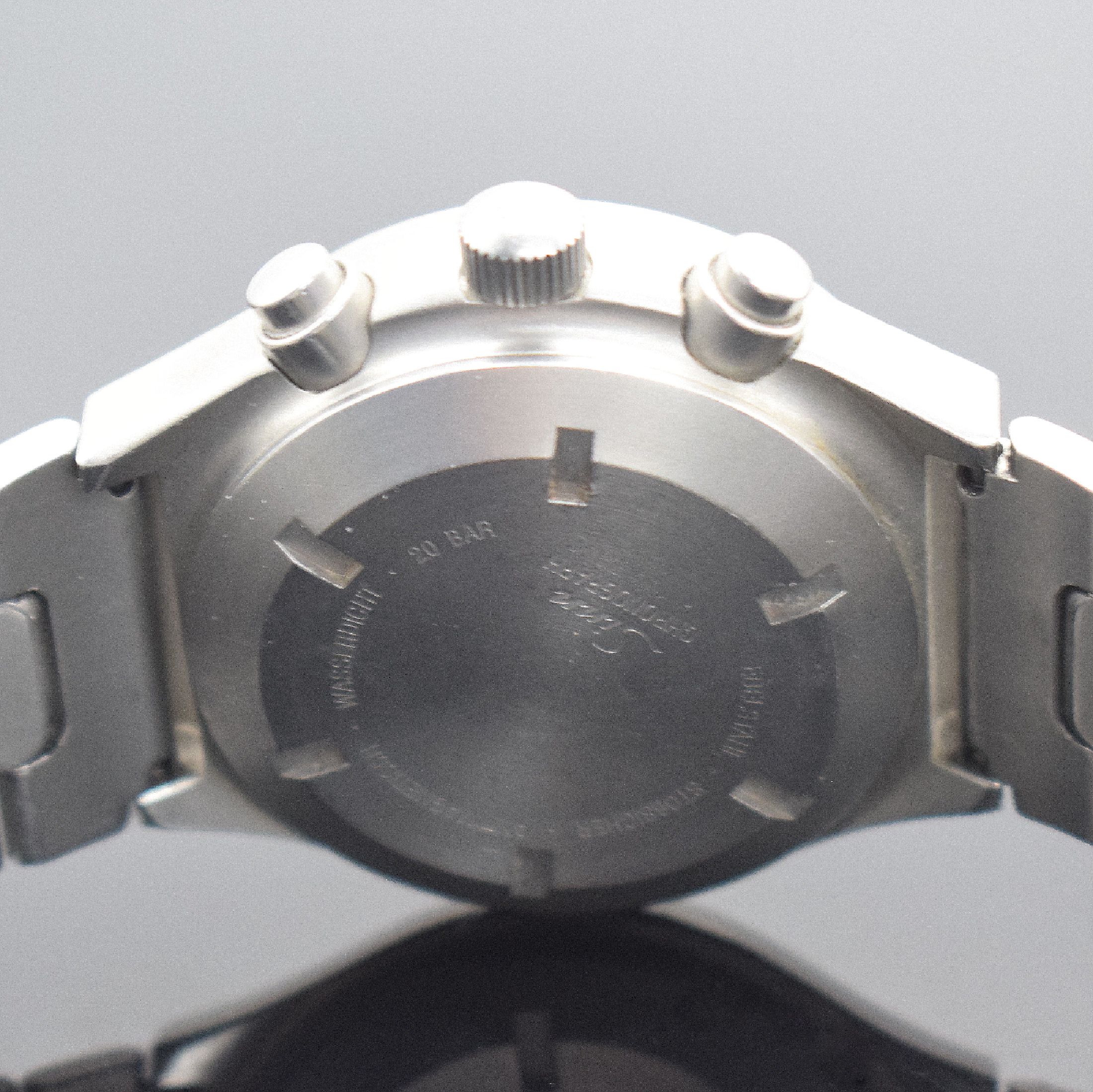 Detail d: SINN Herrenarmbanduhr mit Chronograph in Stahl, Schweiz um 1995, Automatik, matt. Edelstahlgeh. inkl. orig. Gliederband m. Faltschl., Boden & Krone ...
