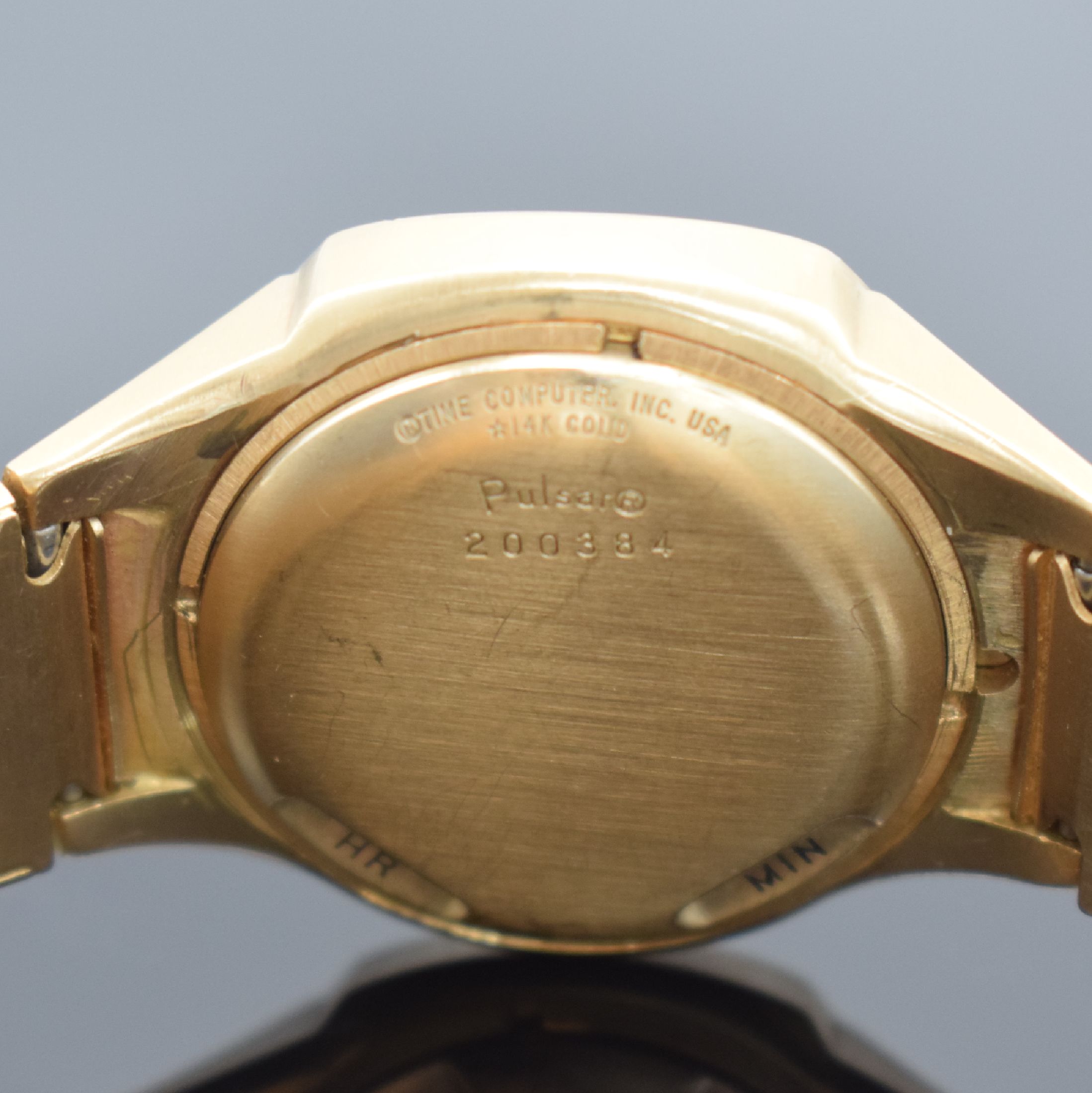 Detail e: PULSAR P4 LED Time Computer / TIFFANY & CO sehr seltene LED Armbanduhr in GG 585/000, USA um 1975, quarz, Geh. an orig. Goldband m. Faltschl. in GG ...