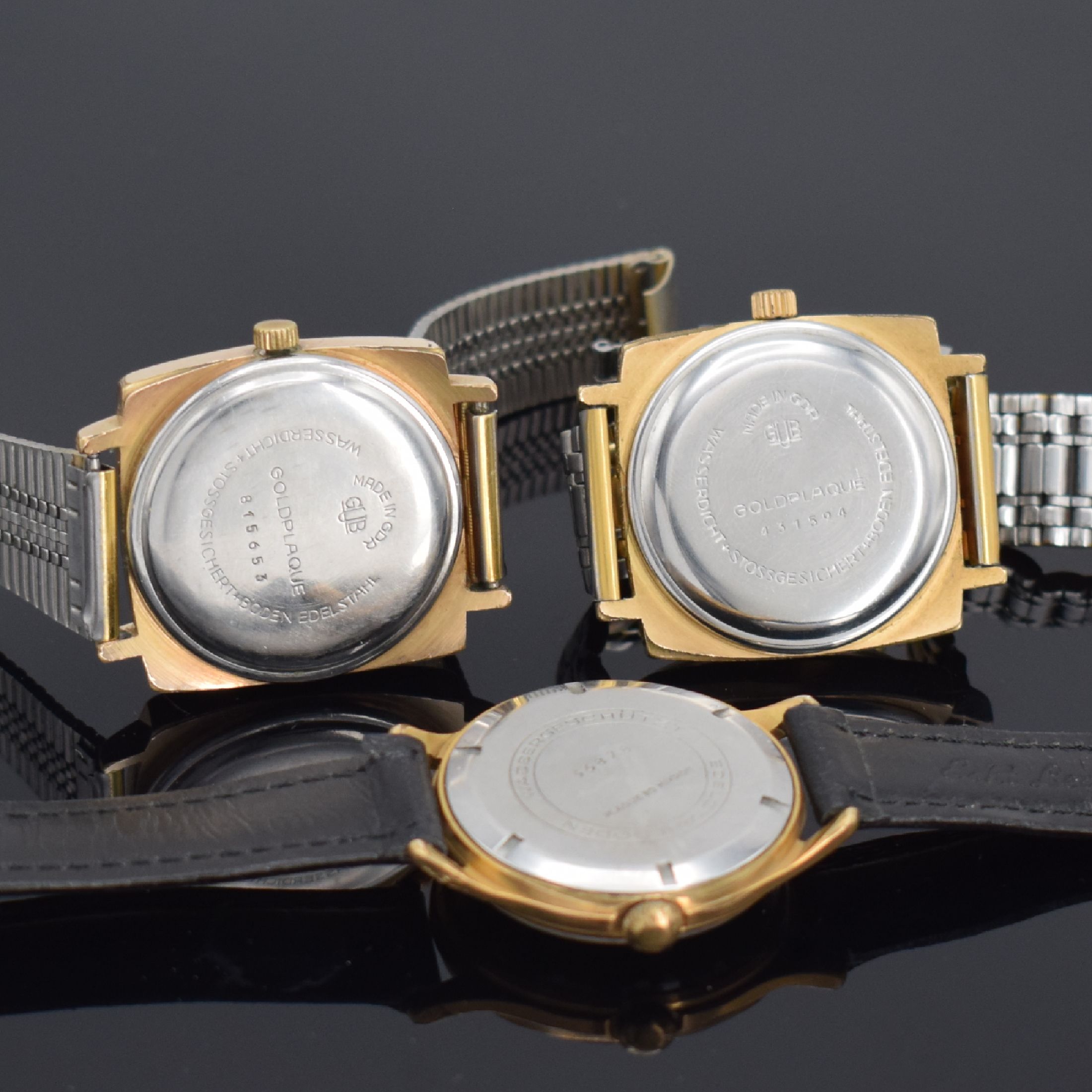 Detail d: 2 GLASHÜTTE Spezimatic & 1x GUB Herrenarmbanduhr, DDR um 1965/1975, Automatik/Handaufzug, verg. Geh., Edelstahlböden aufgedr. & verschr., 2x Fume- ...