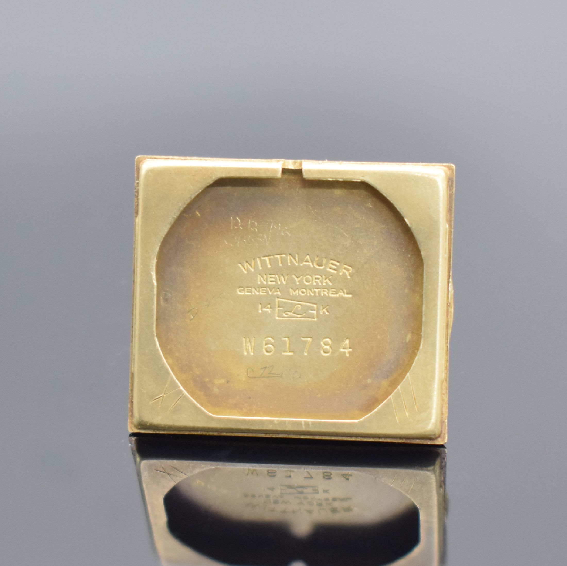 Detail e: WITTNAUER rechteckige Armbanduhr in GG 585/000, USA/Schweiz um 1945, Handaufzug, ausgef. 2-tlg. Geh., Boden aufgedr., silb. Zifferbl. m. gold. ...