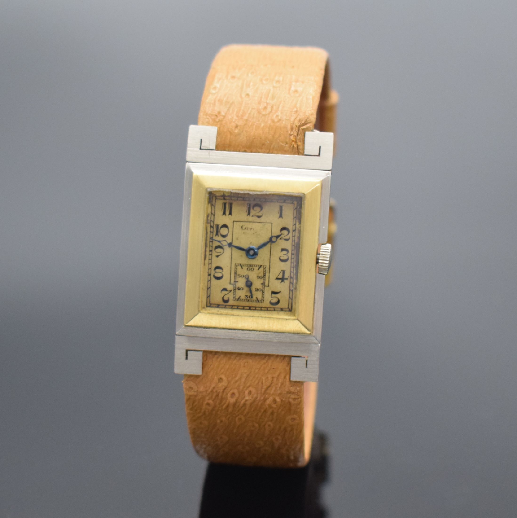 GLYCINE Armbanduhr in GG/WG 750/000, Handaufzug, Schweiz um 1935, ausgef. Scharniergeh. m. bewegl. Bandanst., gold. Duoton-Zifferbl. altersbed. fl., ...