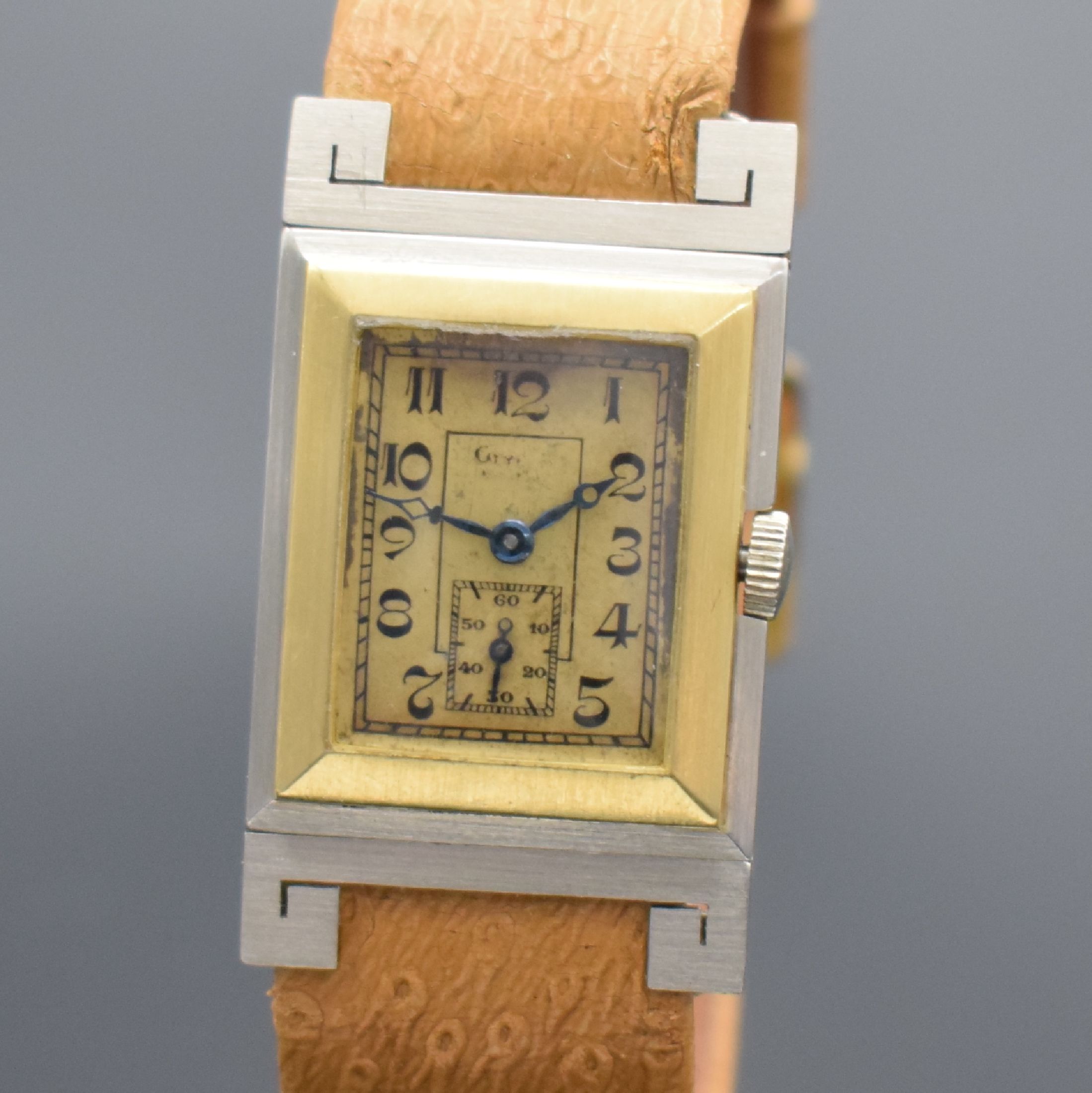 Detail a: GLYCINE Armbanduhr in GG/WG 750/000, Handaufzug, Schweiz um 1935, ausgef. Scharniergeh. m. bewegl. Bandanst., gold. Duoton-Zifferbl. altersbed. fl., ...