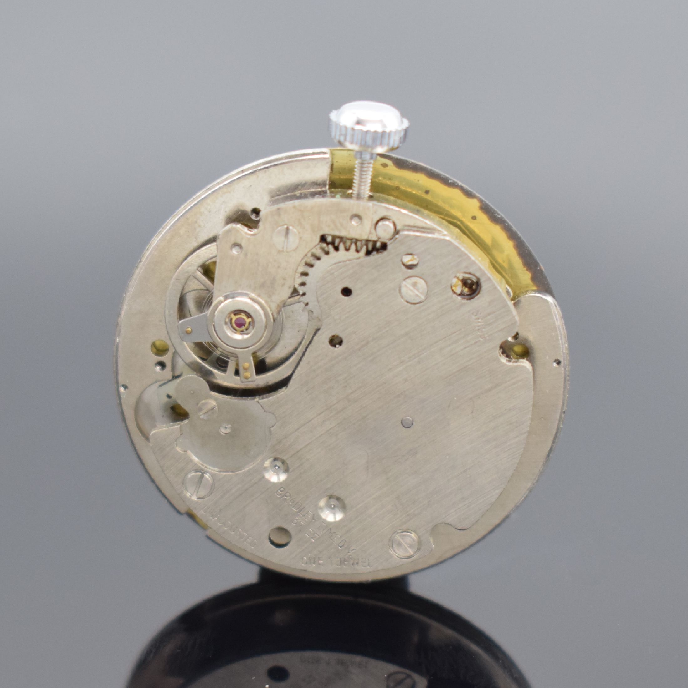 Detail d: MICKEY MOUSE BRADLEY seltene Armbanduhr, Schweiz um 1960, Handaufzug, verchr. Geh., Boden aufgedr., lack. Metallzifferbl. m. M. Mouse Motiv, Min.- & ...