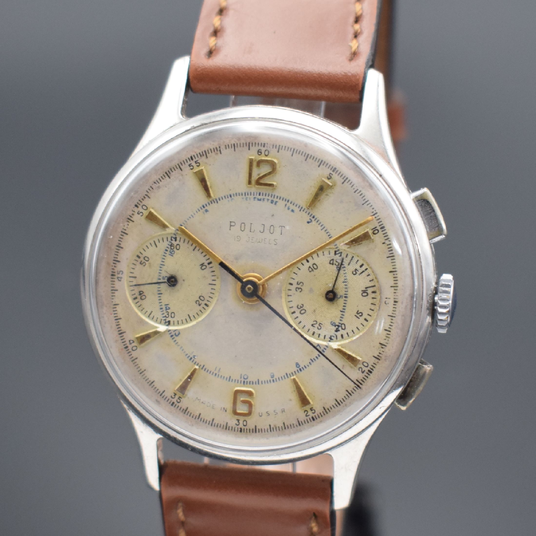 Detail a: POLJOT Schaltradchronograph, UdSSR um 1955, Handaufzug, verchr. Gehäuse m. aufgedr. Stahlboden, silb. Zifferbl. m. gold. Ind. fl./verblichen, gold. ...
