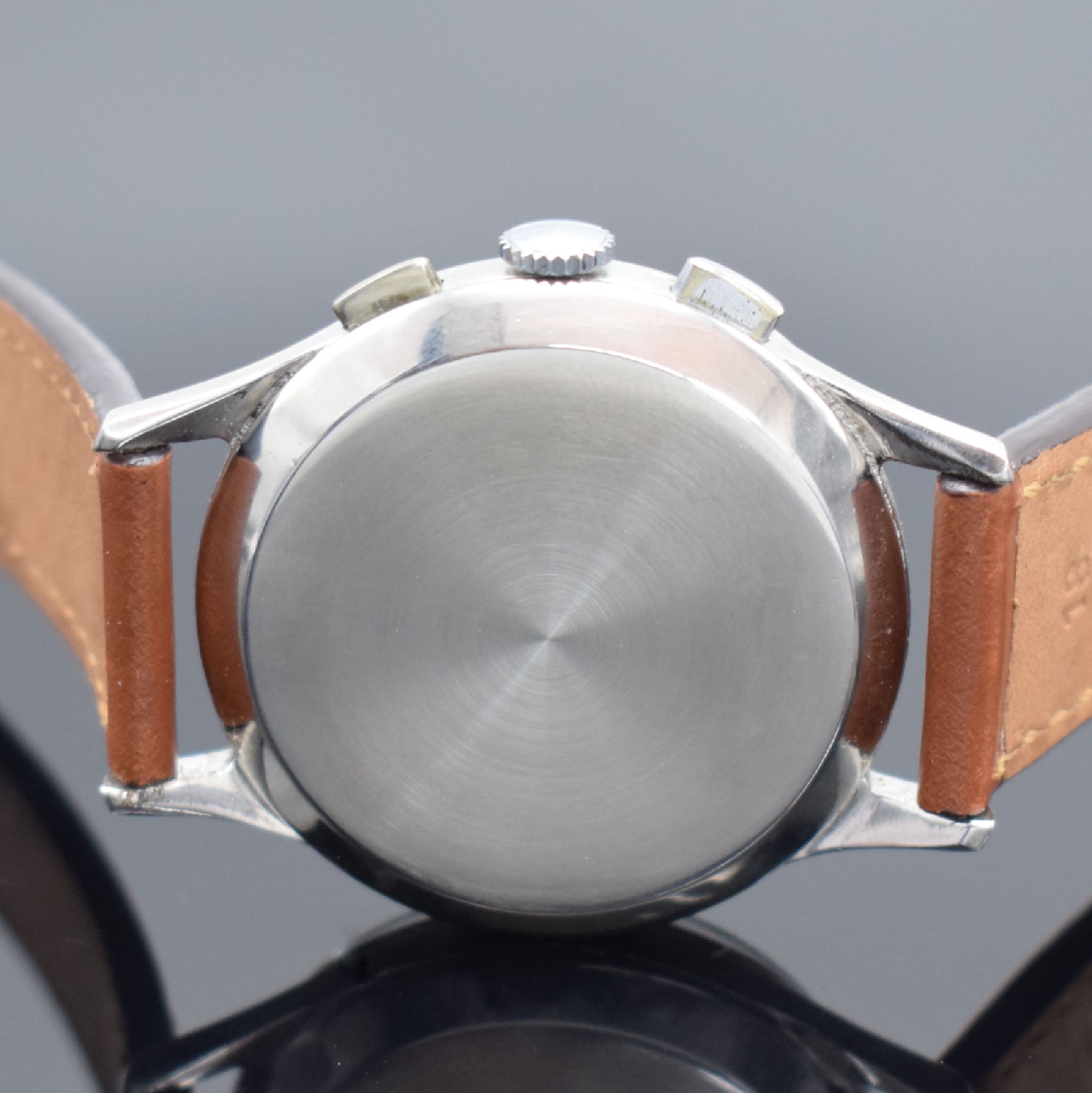 Detail c: POLJOT Schaltradchronograph, UdSSR um 1955, Handaufzug, verchr. Gehäuse m. aufgedr. Stahlboden, silb. Zifferbl. m. gold. Ind. fl./verblichen, gold. ...