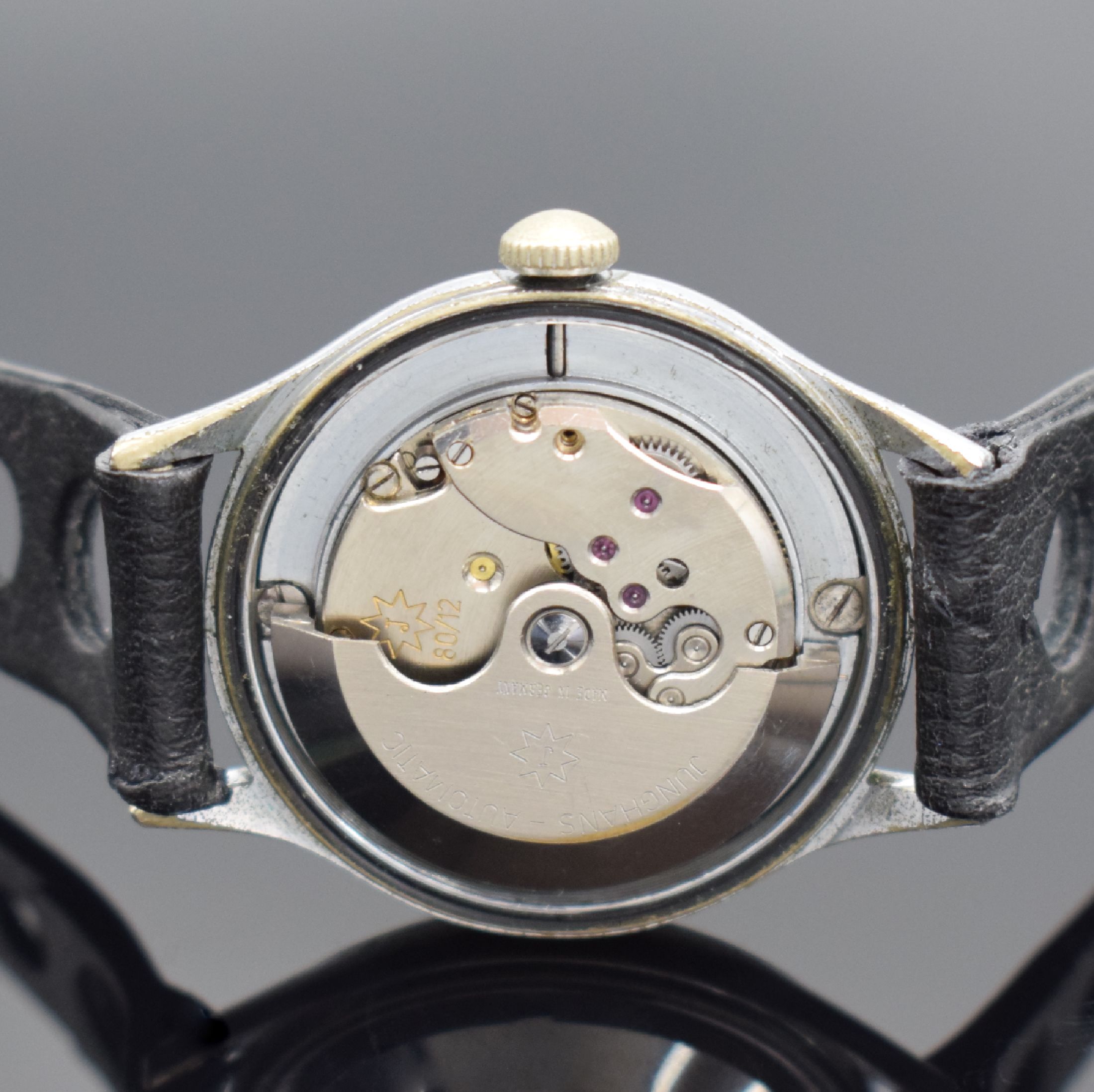 Detail d: JUNGHANS Herrenarmbanduhr mit Gangreserveanzeige durch Fenster bei 6, Deutschland um 1950, Automatik, verchr. Metallgehäuse, Edelstahlboden ...