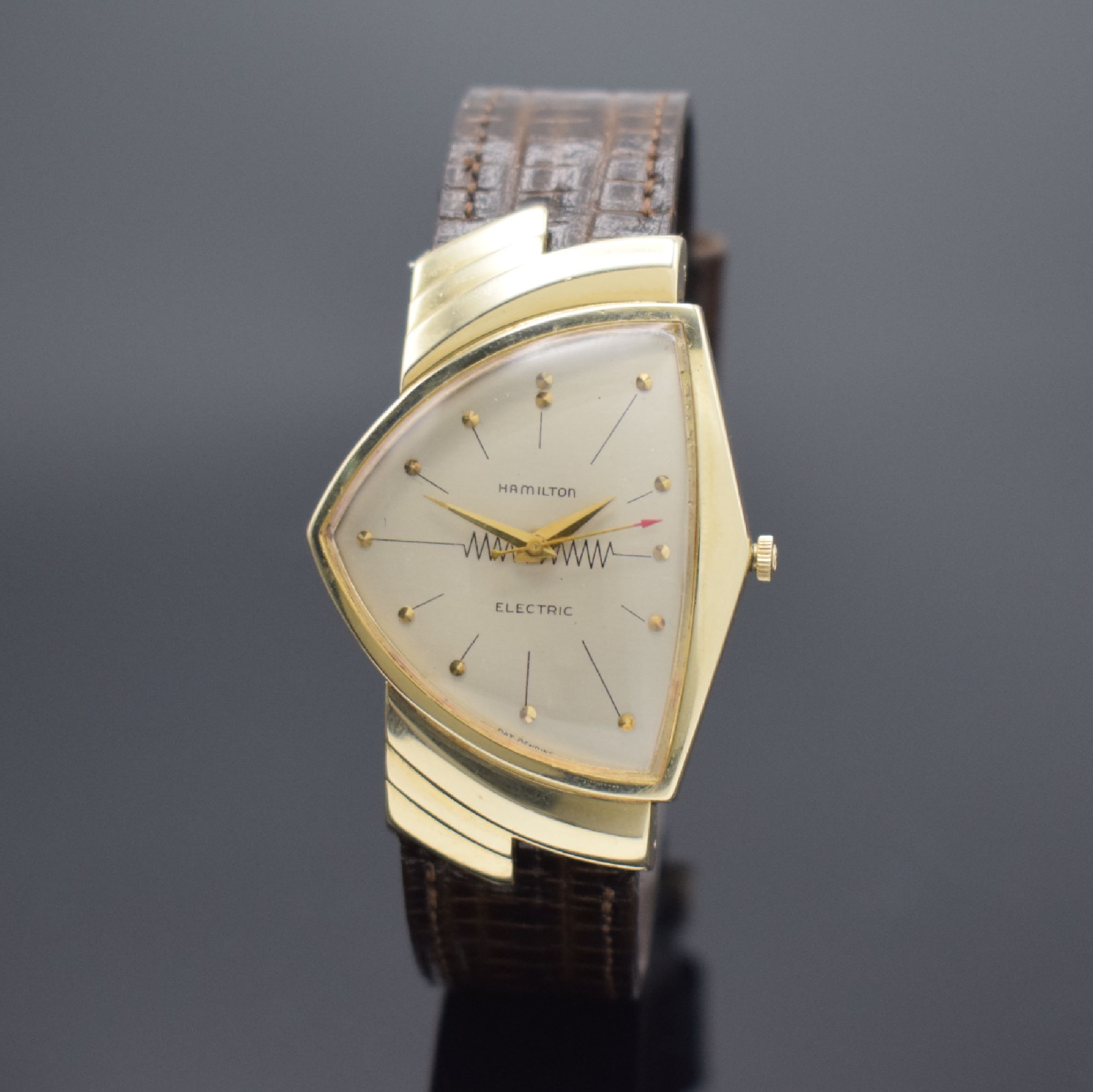HAMILTON ELECTRIC seltene Herrenarmbanduhr in GG 585/000, USA um 1959, asym. Gehäuse, Boden aufgedr., eine der ersten elektromechanischen Uhren, ...