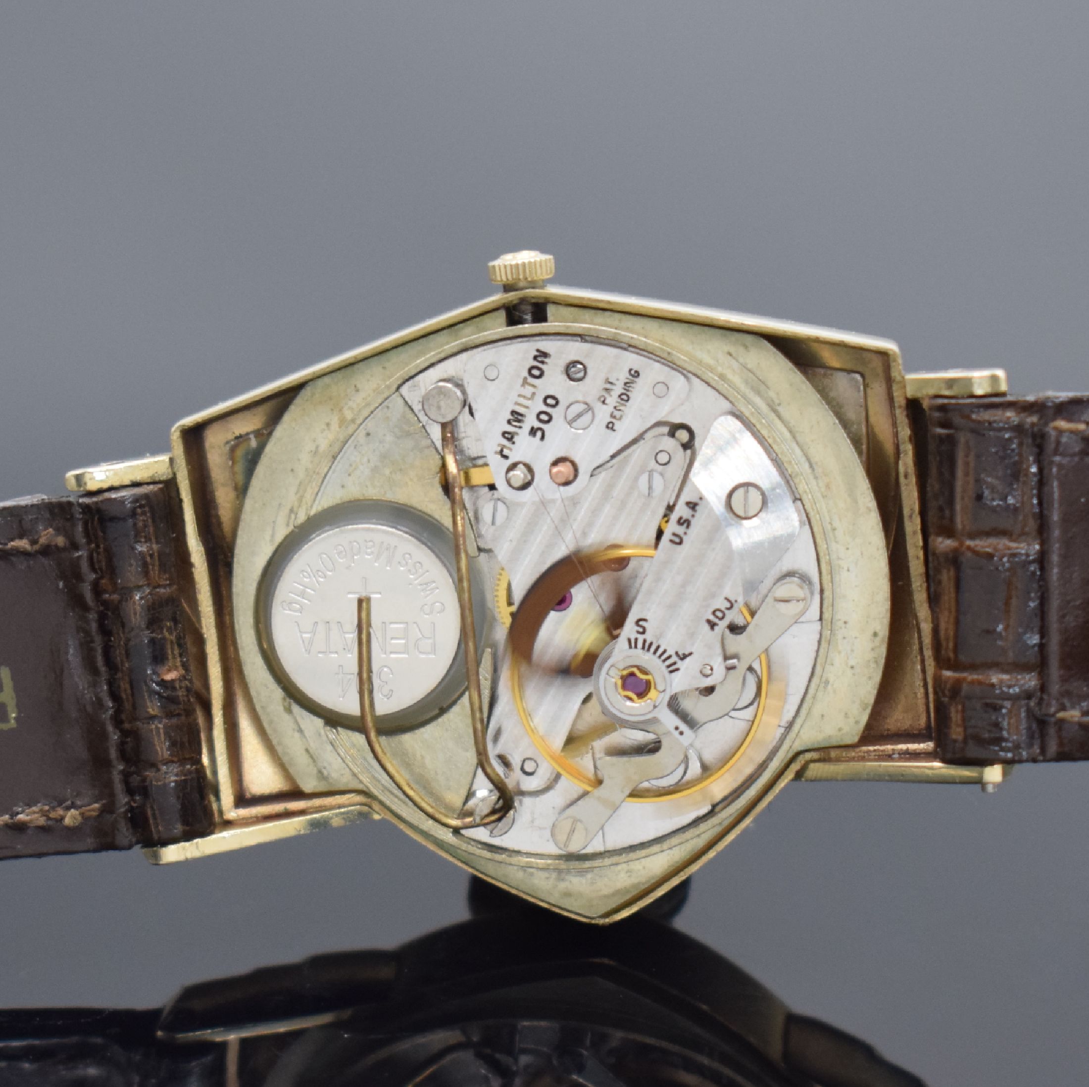 Detail d: HAMILTON ELECTRIC seltene Herrenarmbanduhr in GG 585/000, USA um 1959, asym. Gehäuse, Boden aufgedr., eine der ersten elektromechanischen Uhren, ...