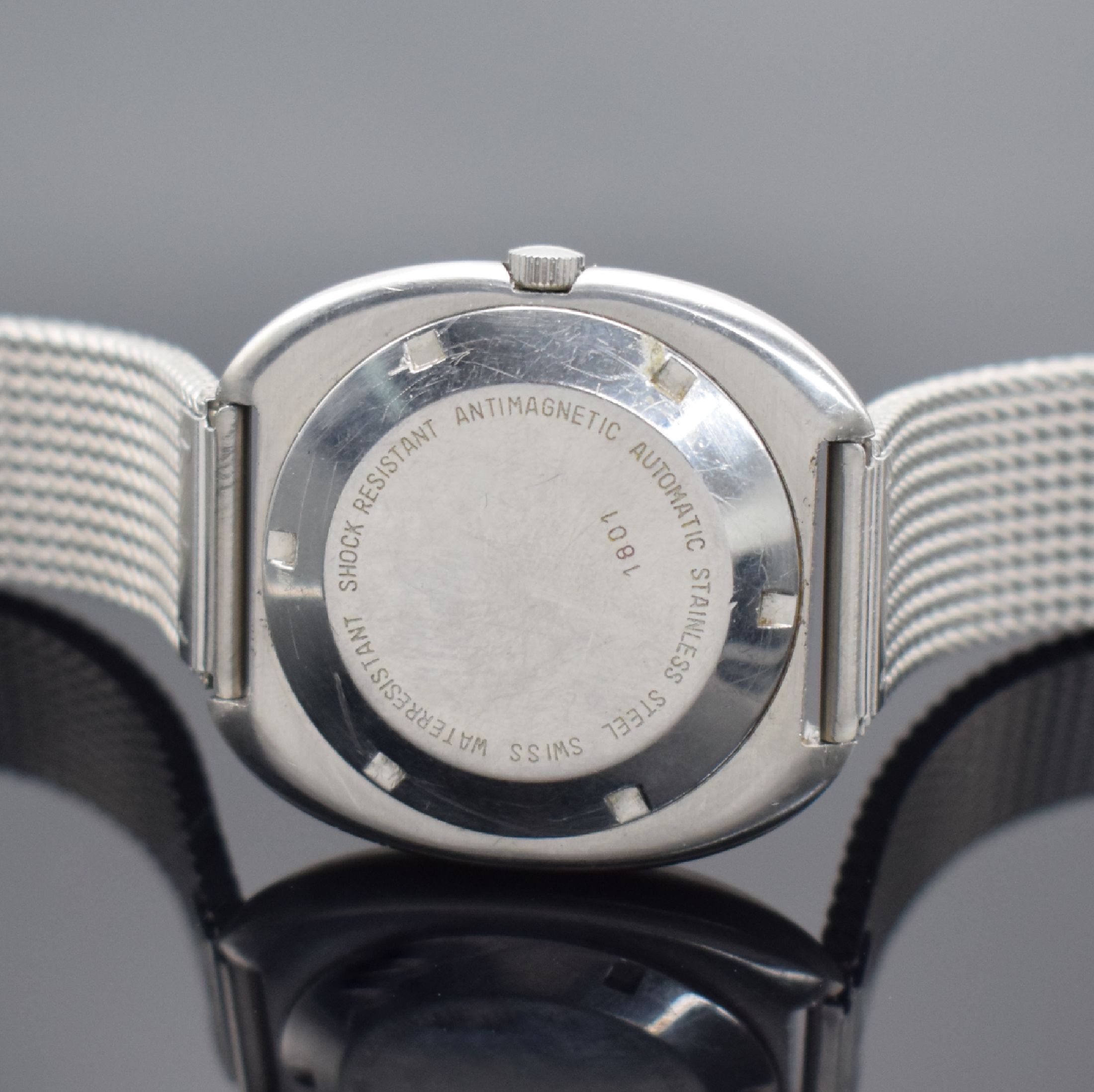 Detail c: BUCHERER Armbandchronometer in Edelstahl, Automatik, Schweiz um 1970, Boden verschr., neutr. Metallband, blaues Zifferbl. altersbed. l. korr., Anz. ...