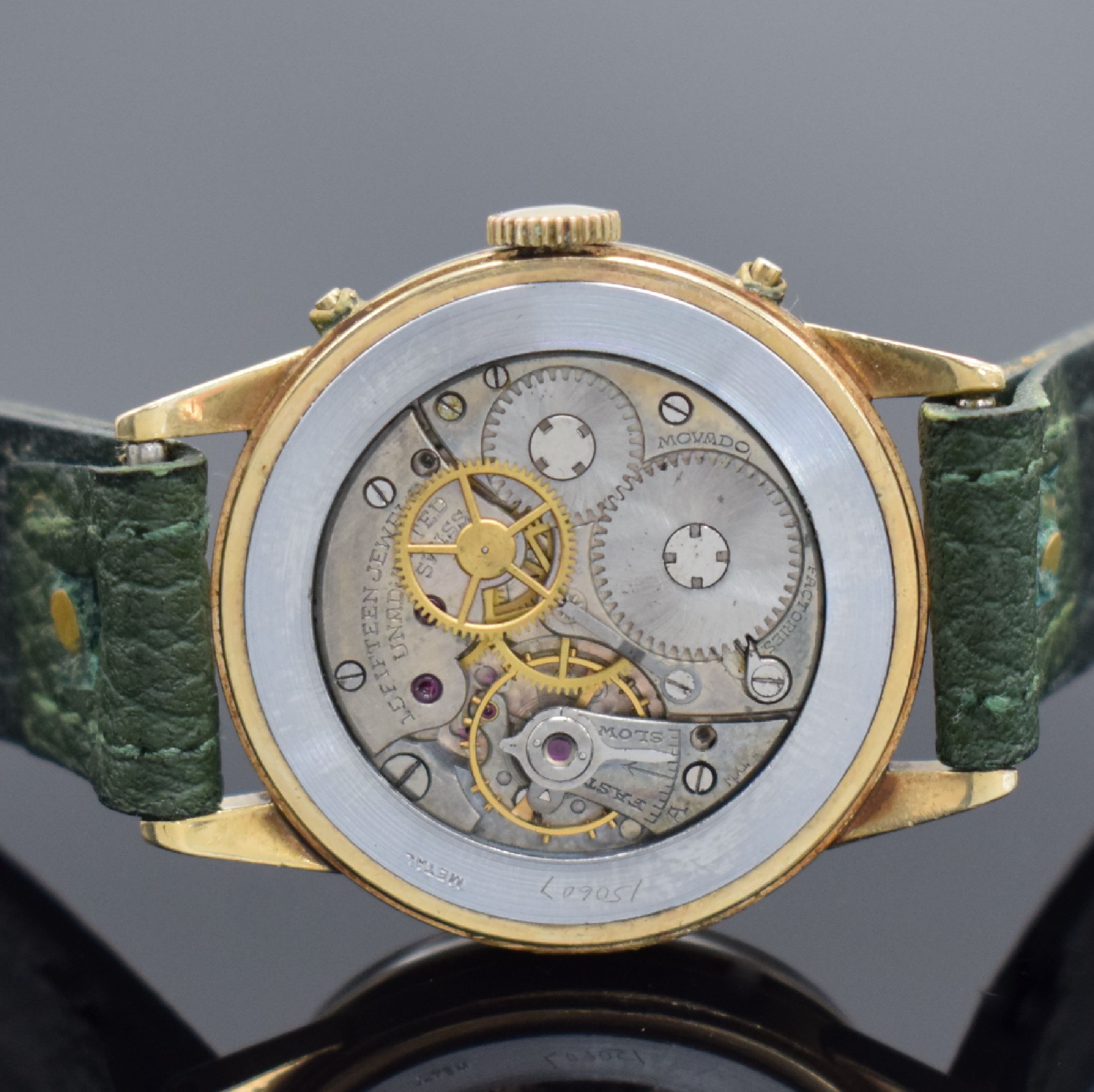 Detail e: MOVADO Triple Calendar Armbanduhr in GG 585/000, Schweiz/USA um 1945, Handaufzug, Ref. 44777, Geh. sign. Wadsworth, Boden & Glasrand aufgedr., ...