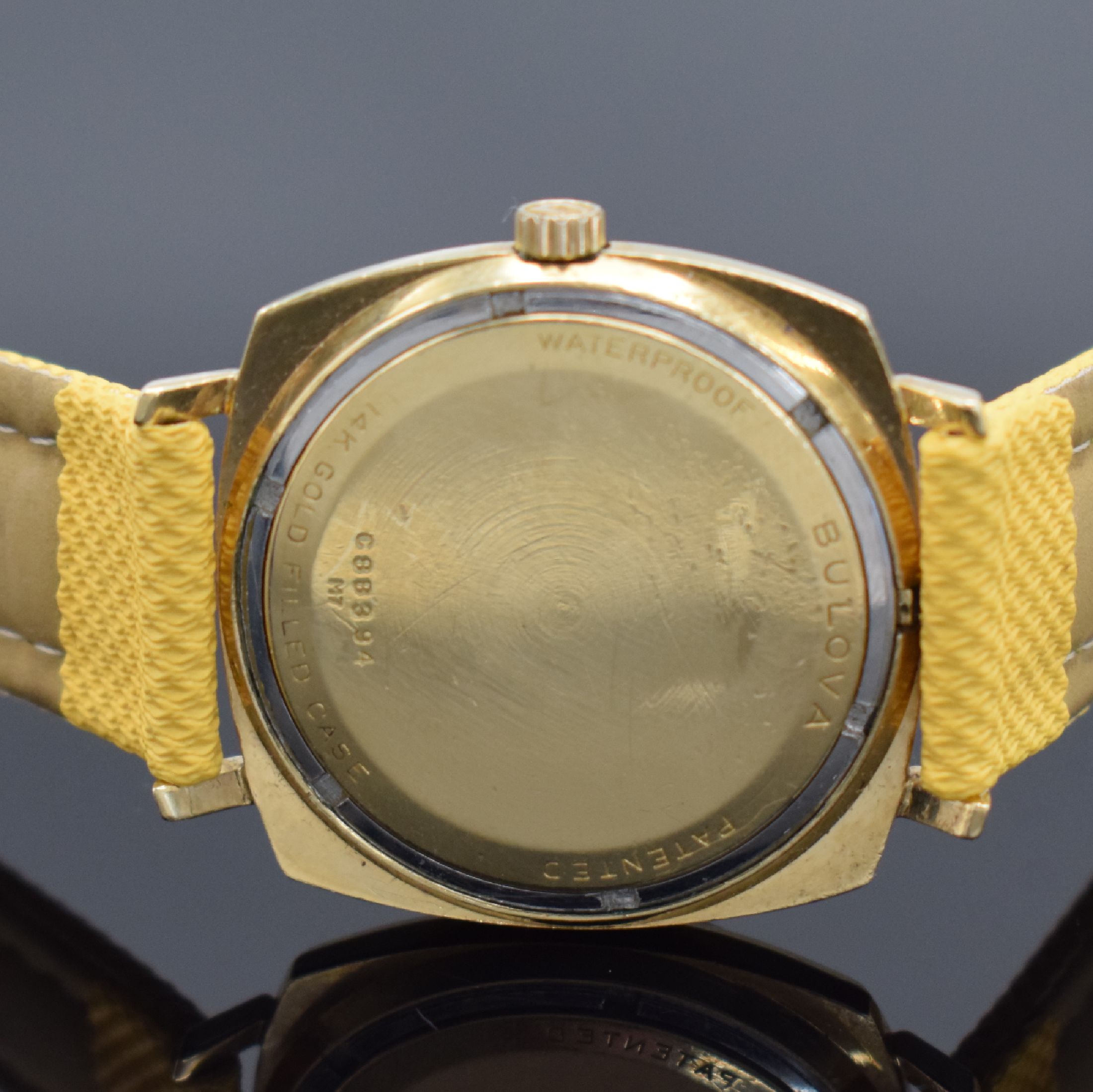Detail c: BULOVA Accutron 14k Gold filled Armbanduhr, Schweiz/USA um 1965, Stimmgabelschwinger, Geh. m. Strahlendekor, Boden verschr., stark pat. Zifferbl. m. ...