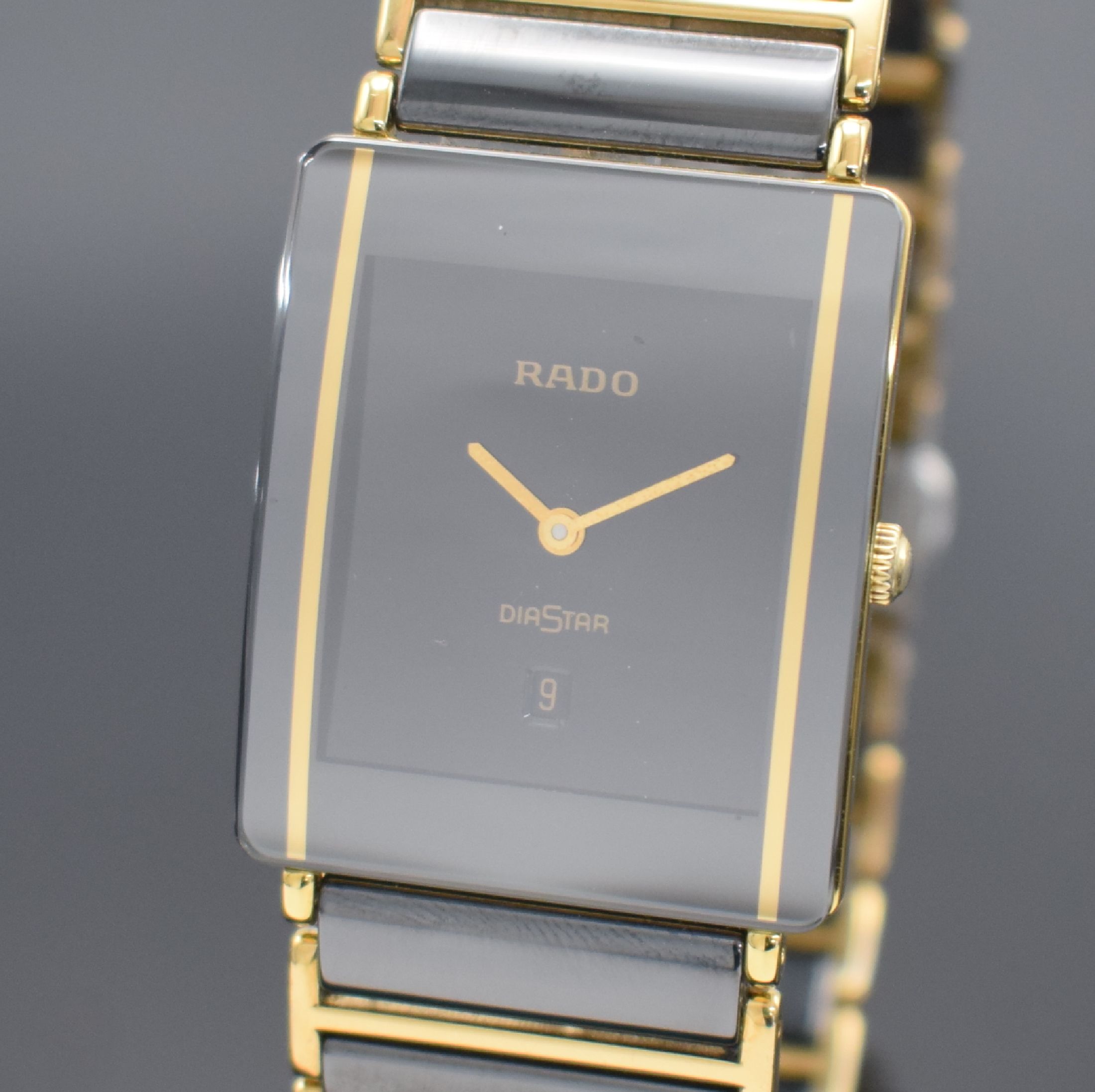 Detail a: RADO Diastar Herrenarmbanduhr, Schweiz um 1995, quarz, Ref. 160.0282.3, Geh. in Stahl teils verg., Keramik Gliederband m. dopp. Faltschl. in Stahl ...
