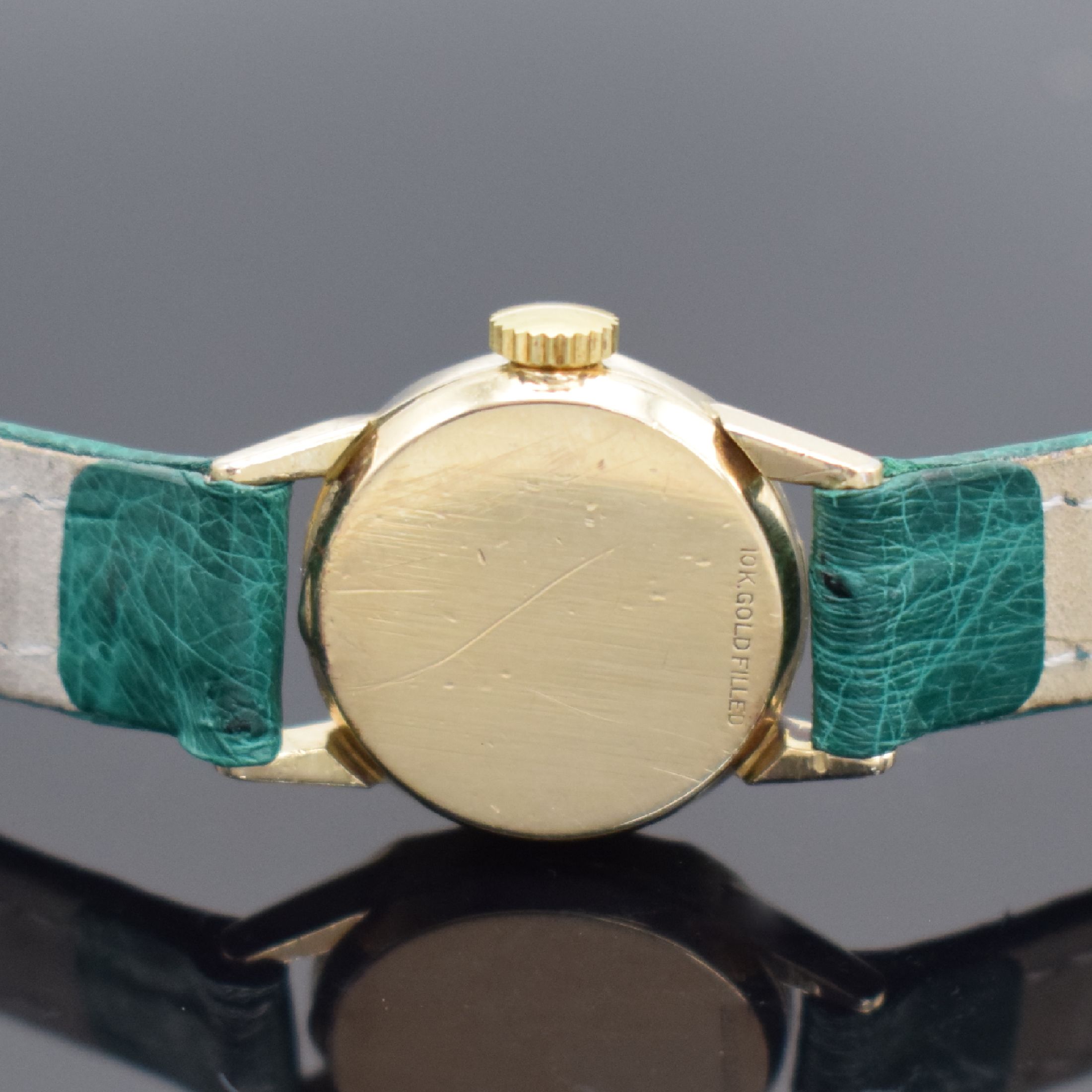 Detail c: LeCoultre 10k gold filled Damenarmbanduhr, Schweiz/USA 1940er Jahre, Handaufzug, facett. Lünette, Boden aufgedr., silb. Zifferbl. rest., silb. ...