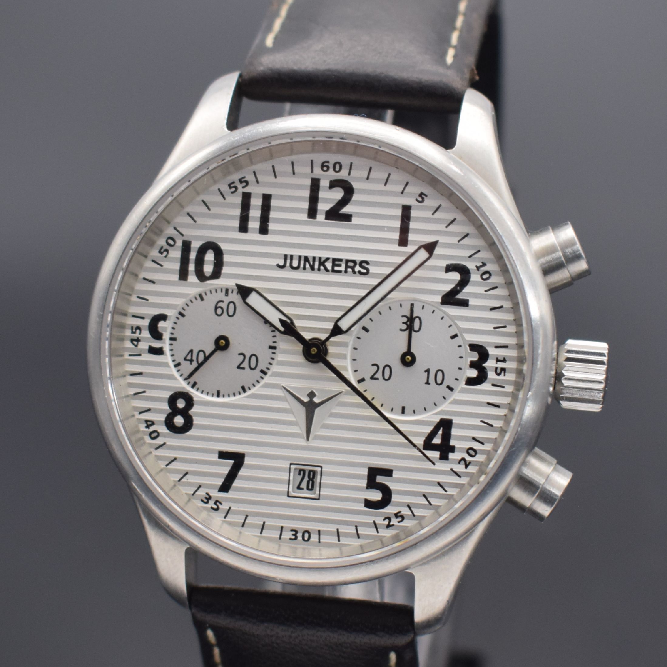 Detail a: JUNKERS Herrenarmbanduhr mit Chronograph, Deutschland um 2005, Handaufzug, beidseitig vergl. Edelstahlgeh., Boden geschr., silbernes Zifferbl. in ...