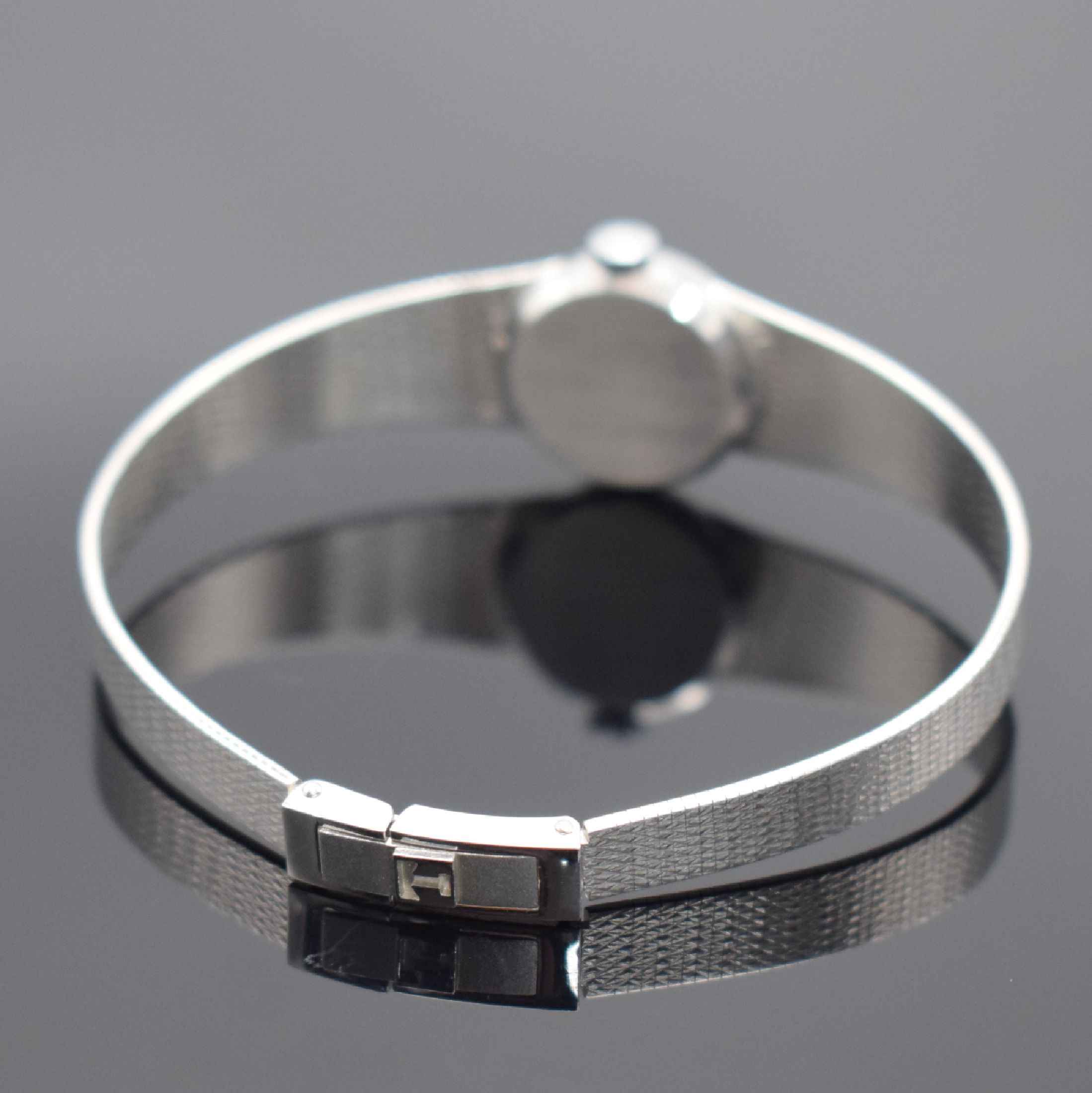 Detail b: TISSOT Damenarmbanduhr in WG 585/000, Schweiz um 1970, Handaufzug, 2-teil. Gehäuse, Boden aufgedr., Milanaiseband, silb. Zifferbl. m. aufges. ...