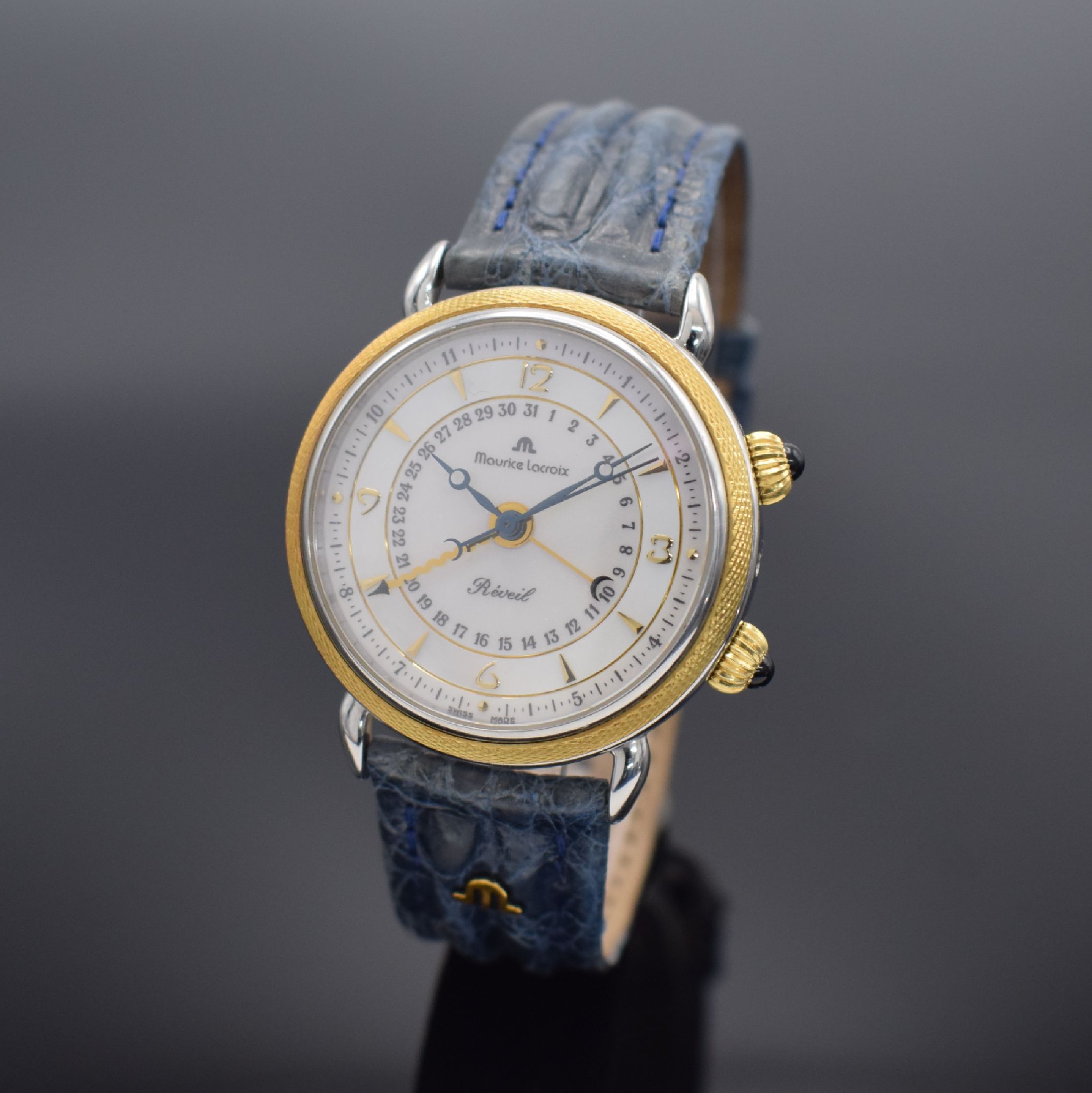 MAURICE LACROIX Armbandwecker Modellserie Reveil, Schweiz um 1995, Handaufzug, Edelstahlgeh., Kronen m. Schmucksteinen, GG- Lünette, beids. ...