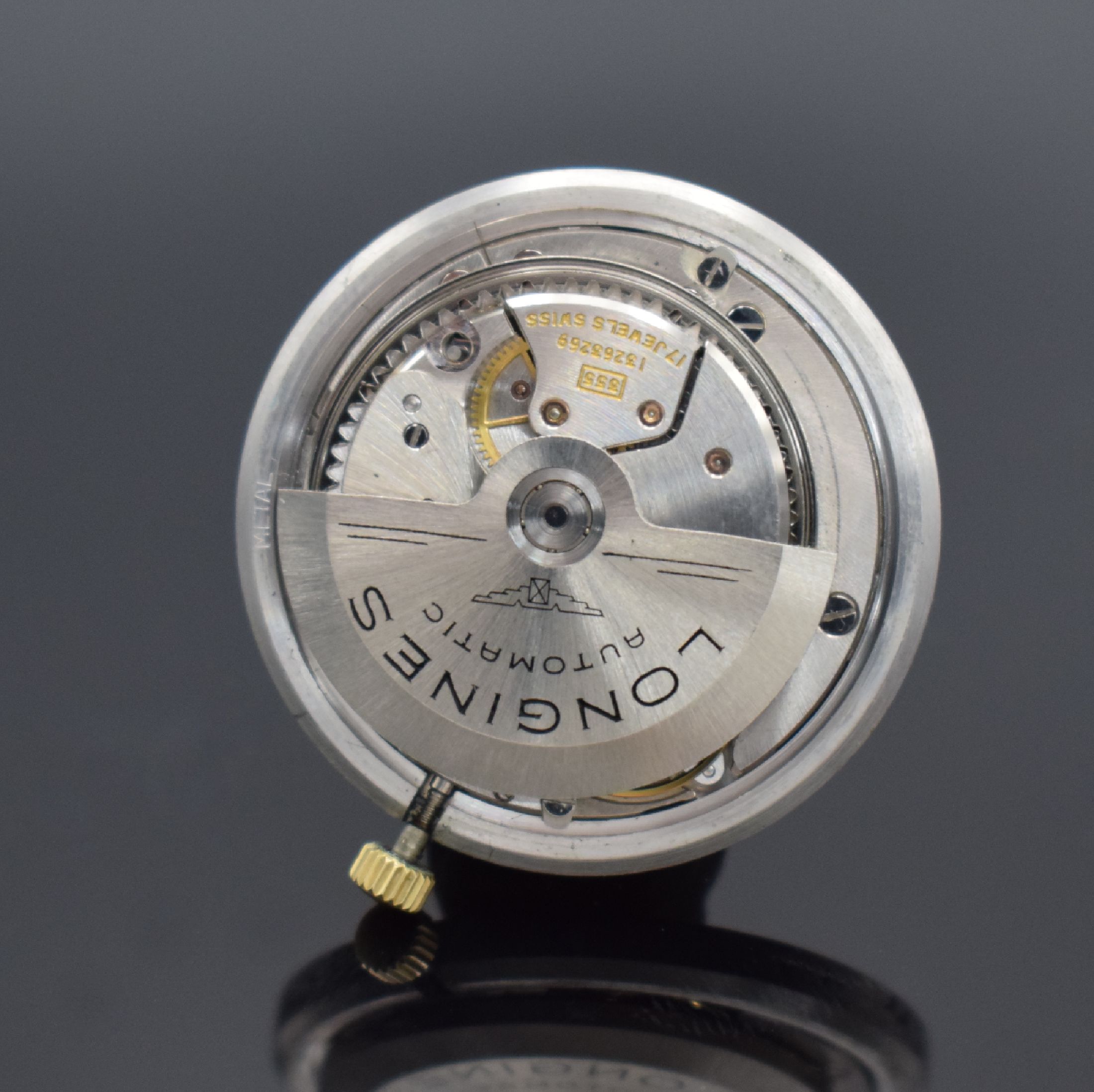 Detail e: LONGINES Herrenarmbanduhr in GG 750/000 Referenz 7497 mit Kaliber 355, Schweiz um 1966, Automatik, 2-teil. Geh. dell., Boden aufgedr., silb. ...
