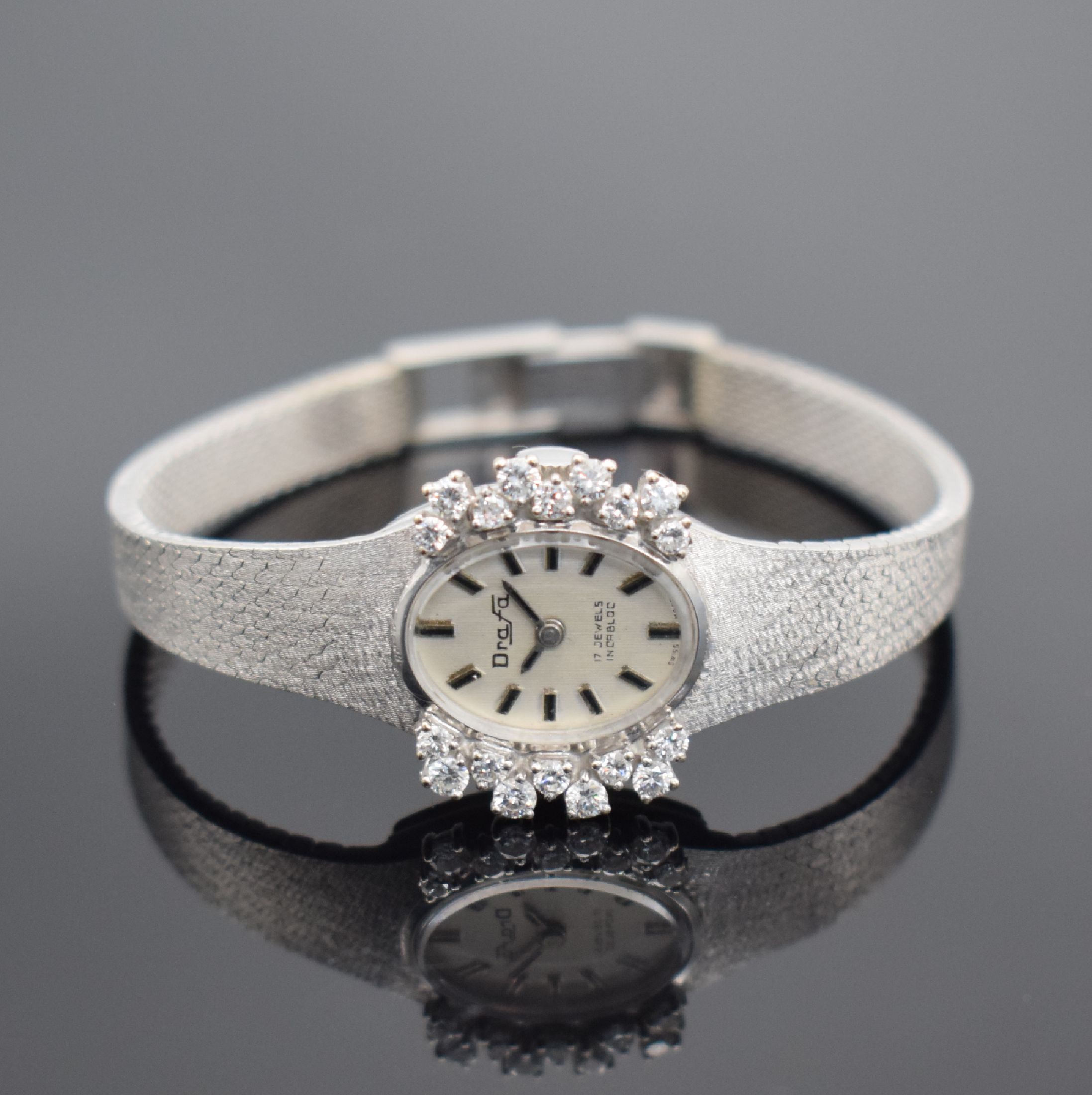 DRAFA Damenarmbanduhr in WG 585/000 mit Diamanten, Schweiz um 1970, Umbau auf quarz später, 2-teil. Geh., Boden aufgedr., Milanaiseband, Lünette ...