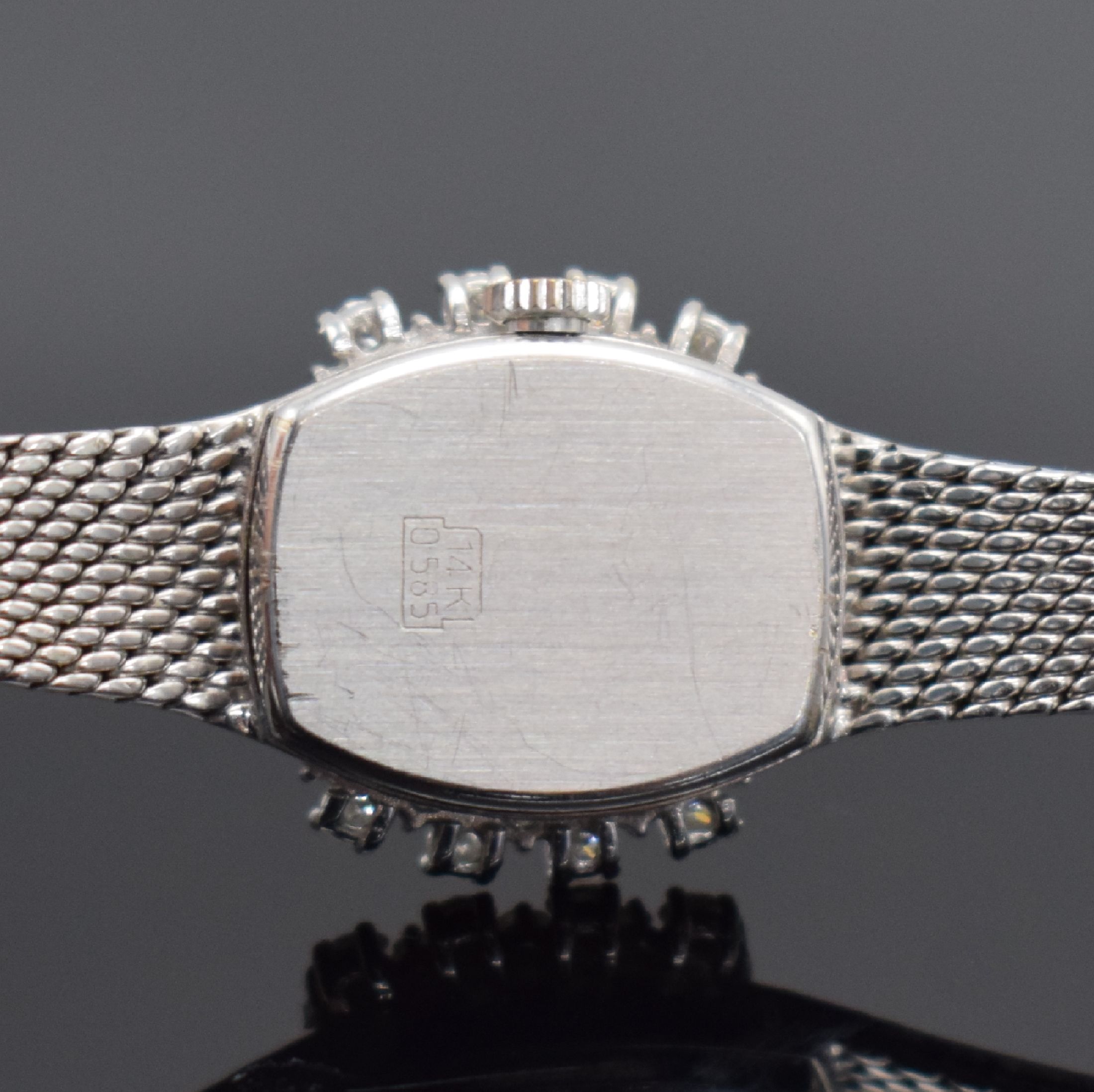 Detail c: DRAFA Damenarmbanduhr in WG 585/000 mit Diamanten, Schweiz um 1970, Umbau auf quarz später, 2-teil. Geh., Boden aufgedr., Milanaiseband, Lünette ...