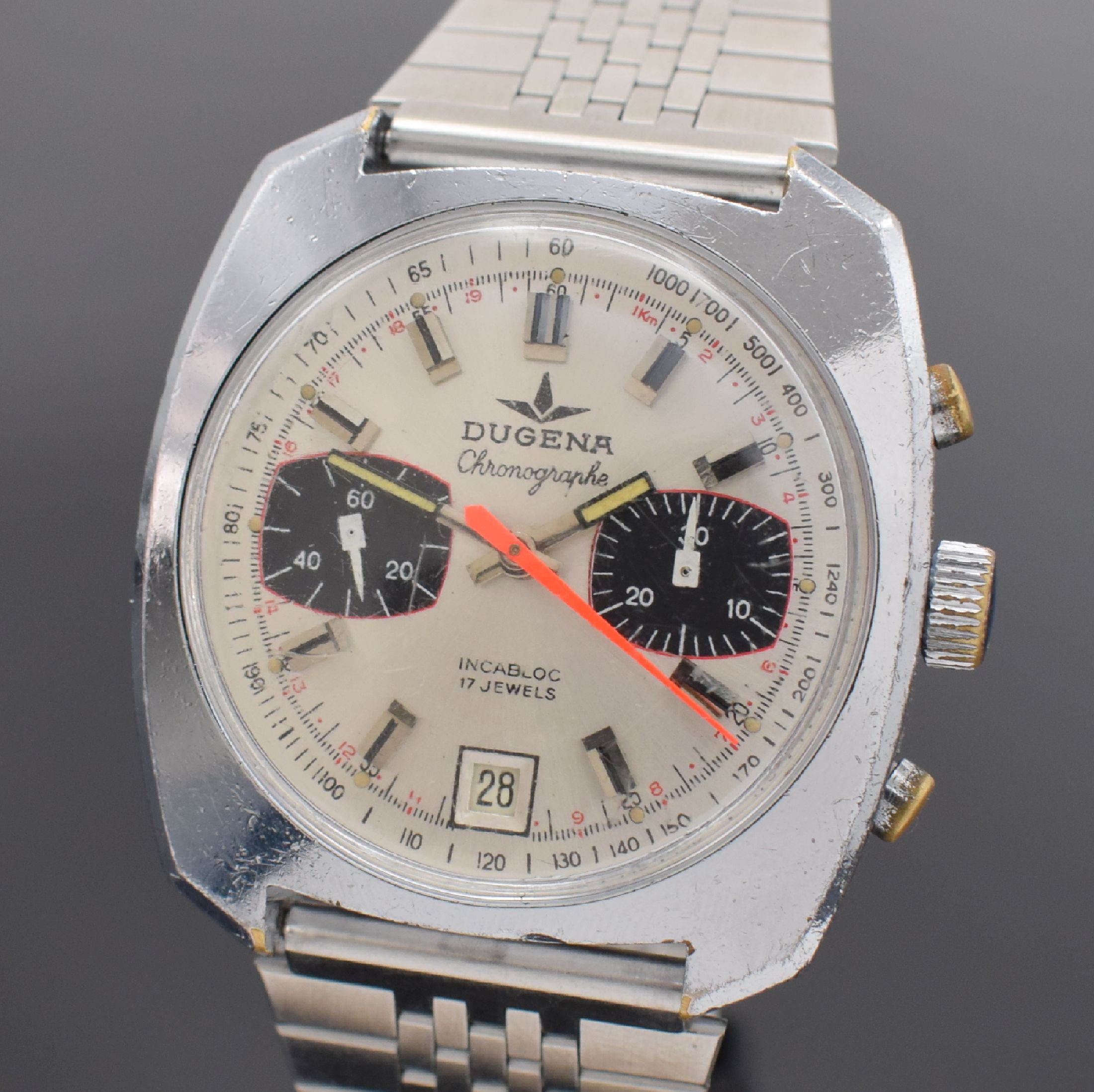 Detail a: DUGENA Herrenarmbanduhr mit Chronograph, Schweiz um 1968, Handaufzug, verchr. Gehäuse, Stahlboden geschr., neutr. Stahlband, silb. Zifferbl. m. ...