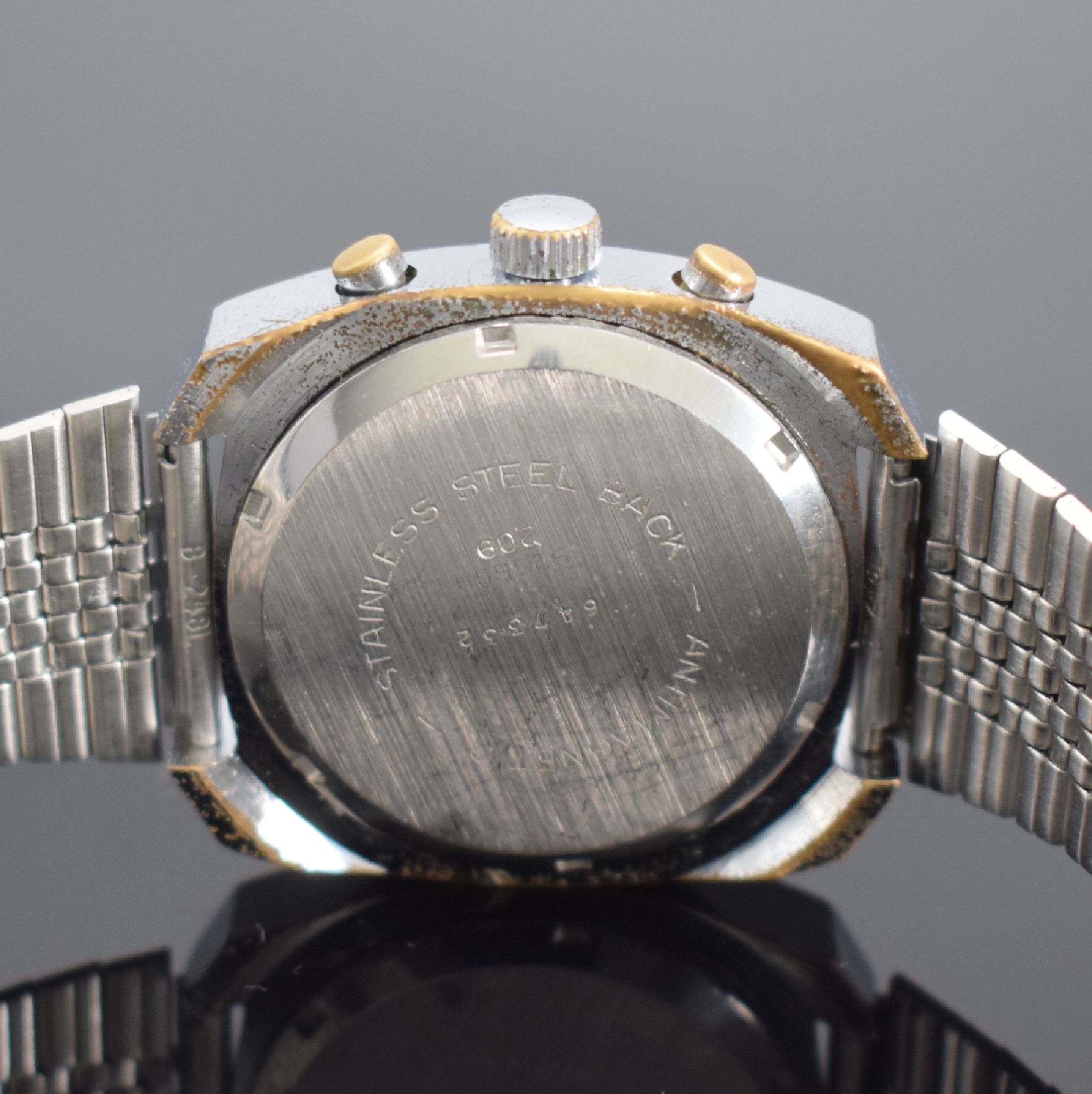 Detail d: DUGENA Herrenarmbanduhr mit Chronograph, Schweiz um 1968, Handaufzug, verchr. Gehäuse, Stahlboden geschr., neutr. Stahlband, silb. Zifferbl. m. ...