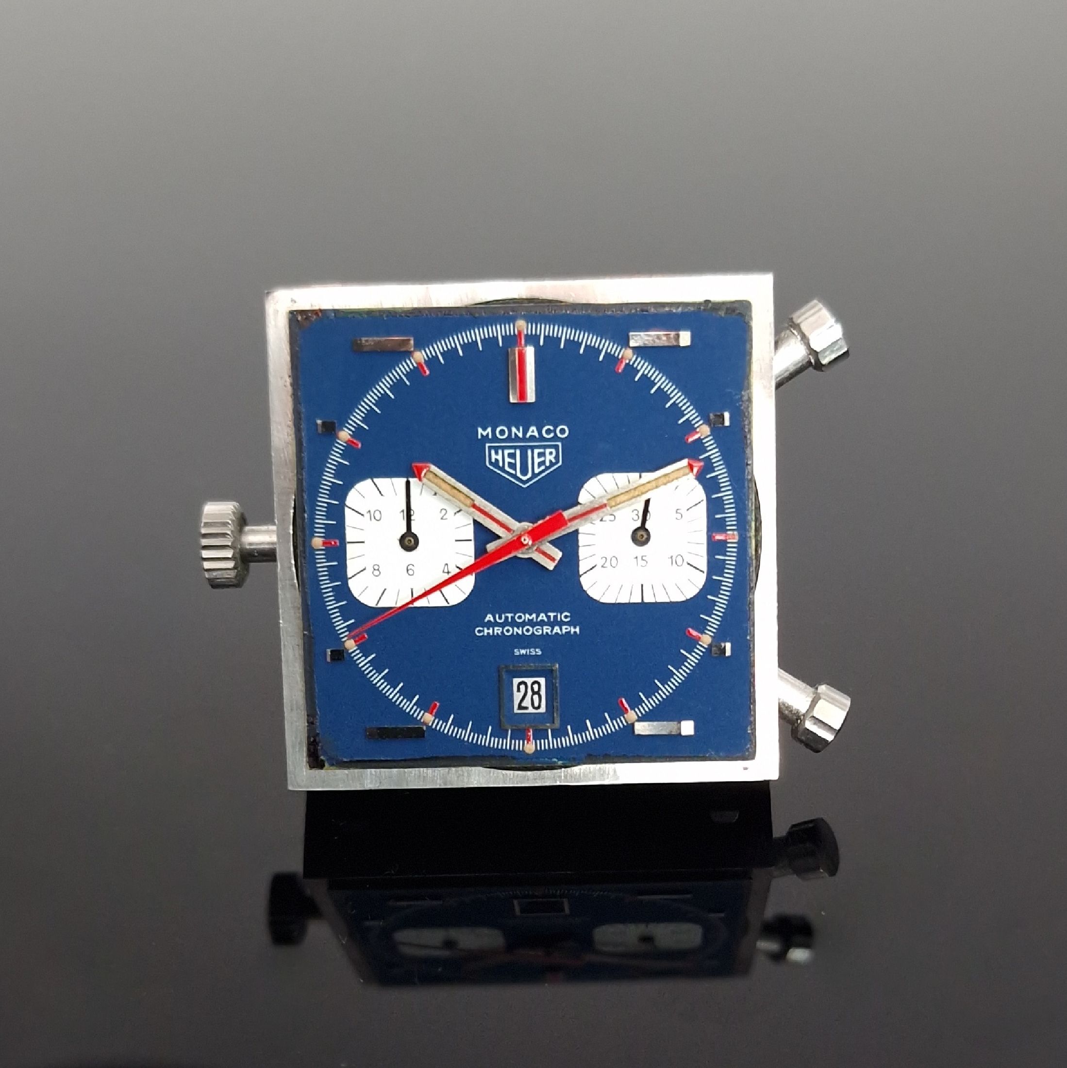 Detail h: HEUER Monaco "Steve McQueen" Herrenarmbanduhr mit Chronograph Referenz 1133, Schweiz um 1972, Automatik, Monocoque-Geh. in Stahl inkl. ...