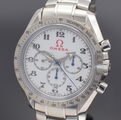 26456412b - OMEGA Speedmaster Broad Arrow chronograph "Olympic" reference 321.10.42.50.04.001, self winding, stainless steel case including bracelet with deployant clasp, screwed down case back with representation of the olympic rings, white dial with Arabic hours, display of hours, minutes, constant second, date & chronograph, blued stop-second hand with representation olympic rings, bezel with engraved tachometer graduation, diameter approx. 42 mm, length approx. 20 cm, original box & blank papers, condition 1-2