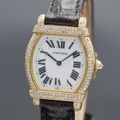 26456441a - CARTIER 18k yellow gold and diamonds set ladies wristwatch Tortue Chinoise reference 2306, quartz, tonneau-shaped, two-piece construction case including original leather strap with original 18k yellow/pink gold deployant clasp, case back 8 times screwed down, silvered structured dial with Roman hours, blued steel hands, display of hours & minutes, measures approx. 34 x 26 mm, condition 2