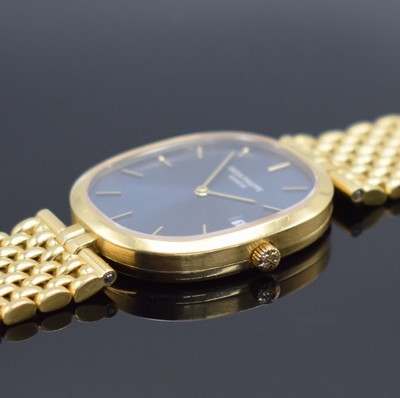 26456469e - PATEK PHILIPPE 18k yellow gold wristwatch Ellipse reference 3930/1, quartz, two-piece construction case including bracelet, blue "Sigma" dial with raised gold-indices, display of hours, minutes & date, measures approx. 34 x 29 mm, length approx. 18,5 cm, PPC extract of the archives from November 2021 enclosed, condition 2