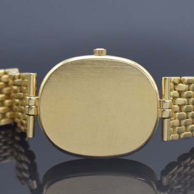 26456469f - PATEK PHILIPPE 18k yellow gold wristwatch Ellipse reference 3930/1, quartz, two-piece construction case including bracelet, blue "Sigma" dial with raised gold-indices, display of hours, minutes & date, measures approx. 34 x 29 mm, length approx. 18,5 cm, PPC extract of the archives from November 2021 enclosed, condition 2