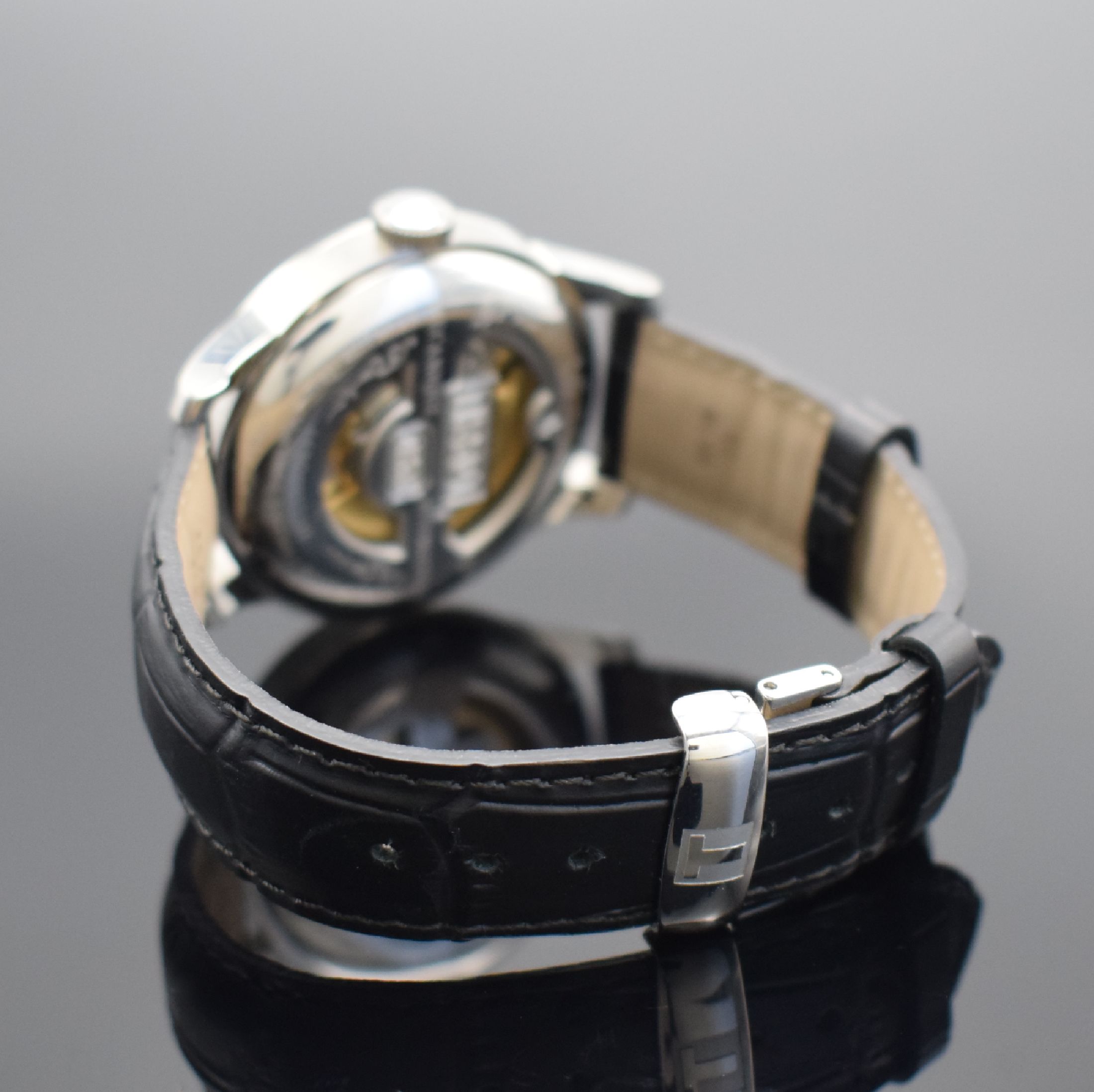 Detail b: TISSOT Le Locle Herrenarmbanduhr in Stahl Referenz L164/264-1, Automatik, Schweiz um 2010, 3-teil. Geh., Boden & Glasrand aufgedr., orig. Lederband ...