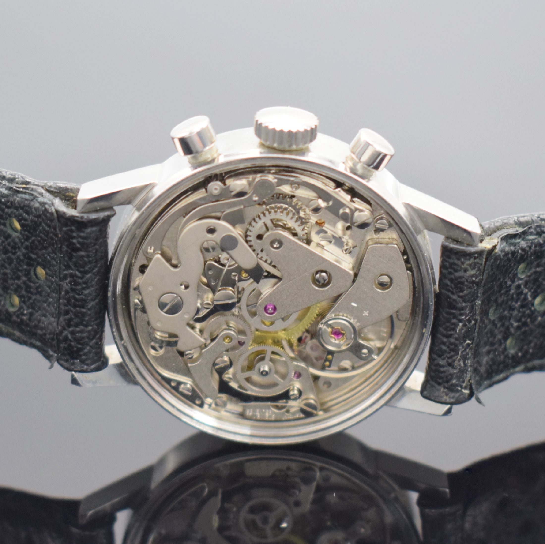 Detail d: HEUER seltener Armbandchronograph Referenz 73623, Schweiz um 1971, Handaufzug, Edelstahlgeh. inkl. Lederband m. Heuer Dornschl., Boden verschr., ...
