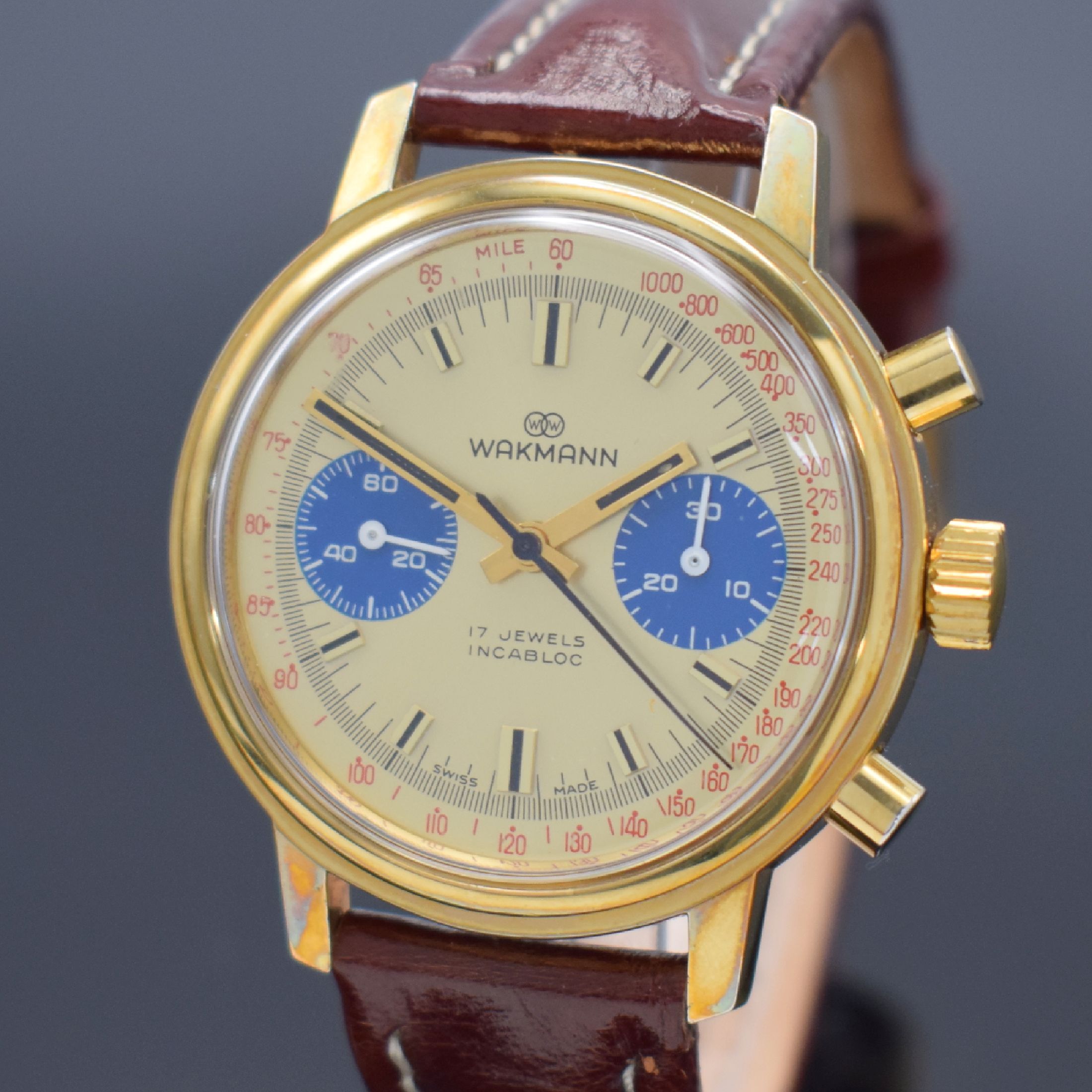 Detail a: WAKMANN Schaltradchronograph, Handaufzug, Schweiz 1967, verg. Metallgeh., verschr. Edelstahlboden & Werk bez. Charles Gigandet, gold. Zifferblatt m. ...