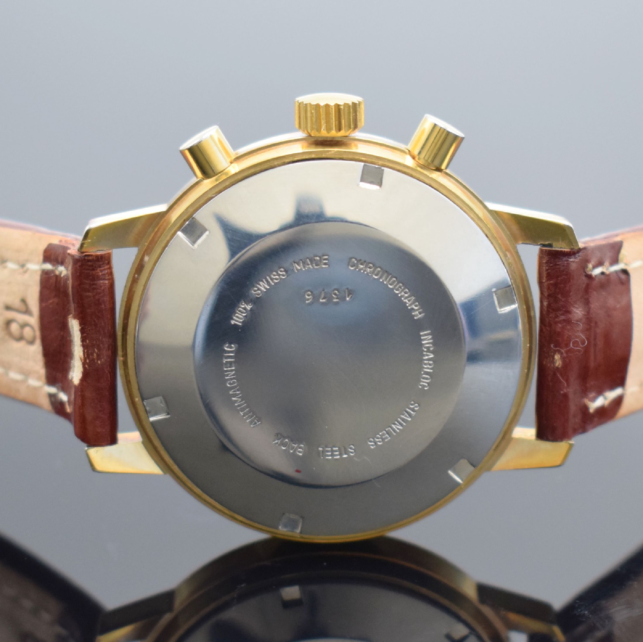 Detail b: WAKMANN Schaltradchronograph, Handaufzug, Schweiz 1967, verg. Metallgeh., verschr. Edelstahlboden & Werk bez. Charles Gigandet, gold. Zifferblatt m. ...
